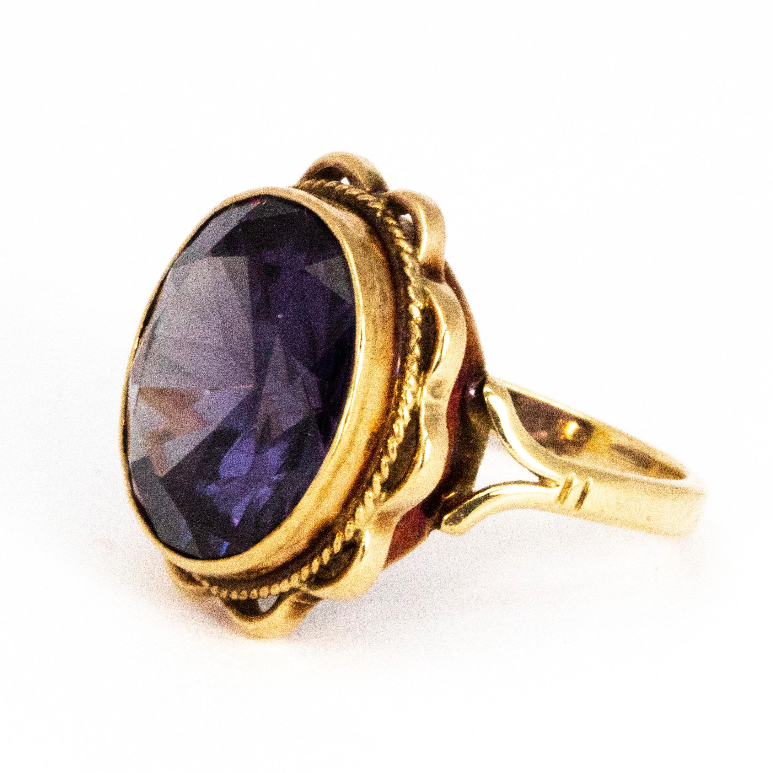 This stunning amethysts has ripples of gold surrounding the simple setting. The stone is approx 10carat and has the most beautiful purple colour and the light reflects perfectly. 

Ring Size: N 1/2 or 7
Stone Dimensions: 15mm x 13.5mm