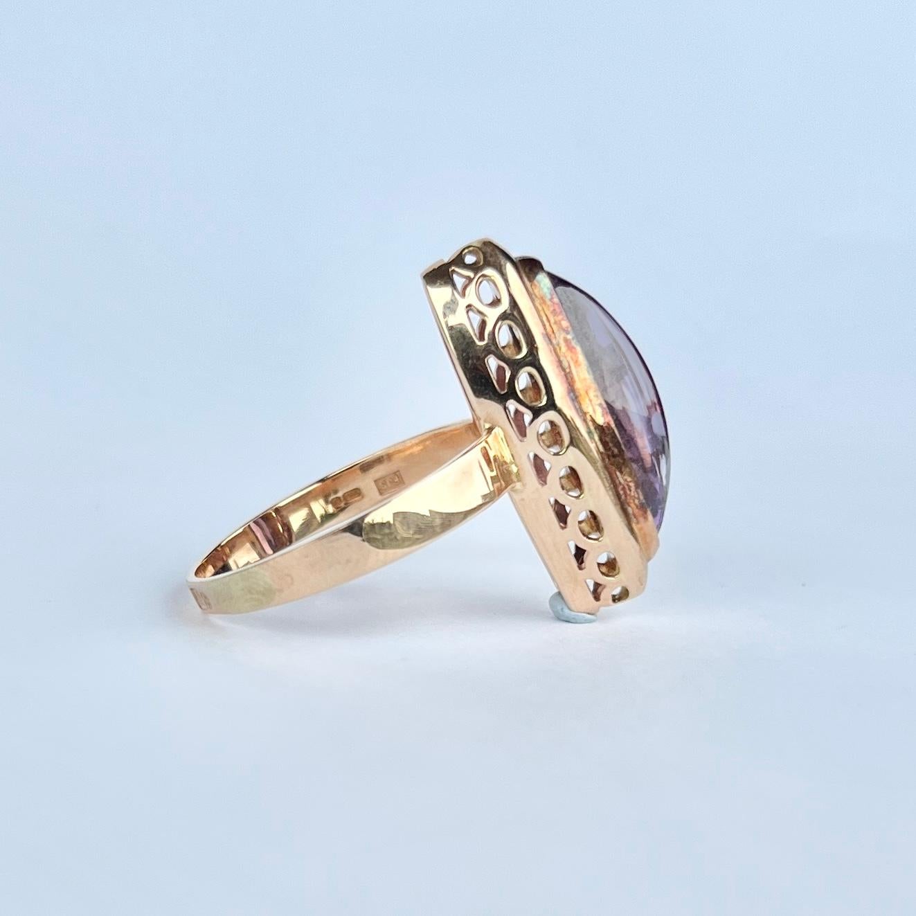 This glossy and bright purple amethyst stone is surrounded by a delicate frame of soft tone rose gold. Modelled in 9ct gold.

Ring Size: P 1/2 or 8 
Stone Dimensions: 17x6mm 
Height off finger: 10mm

Weight: 4.8g