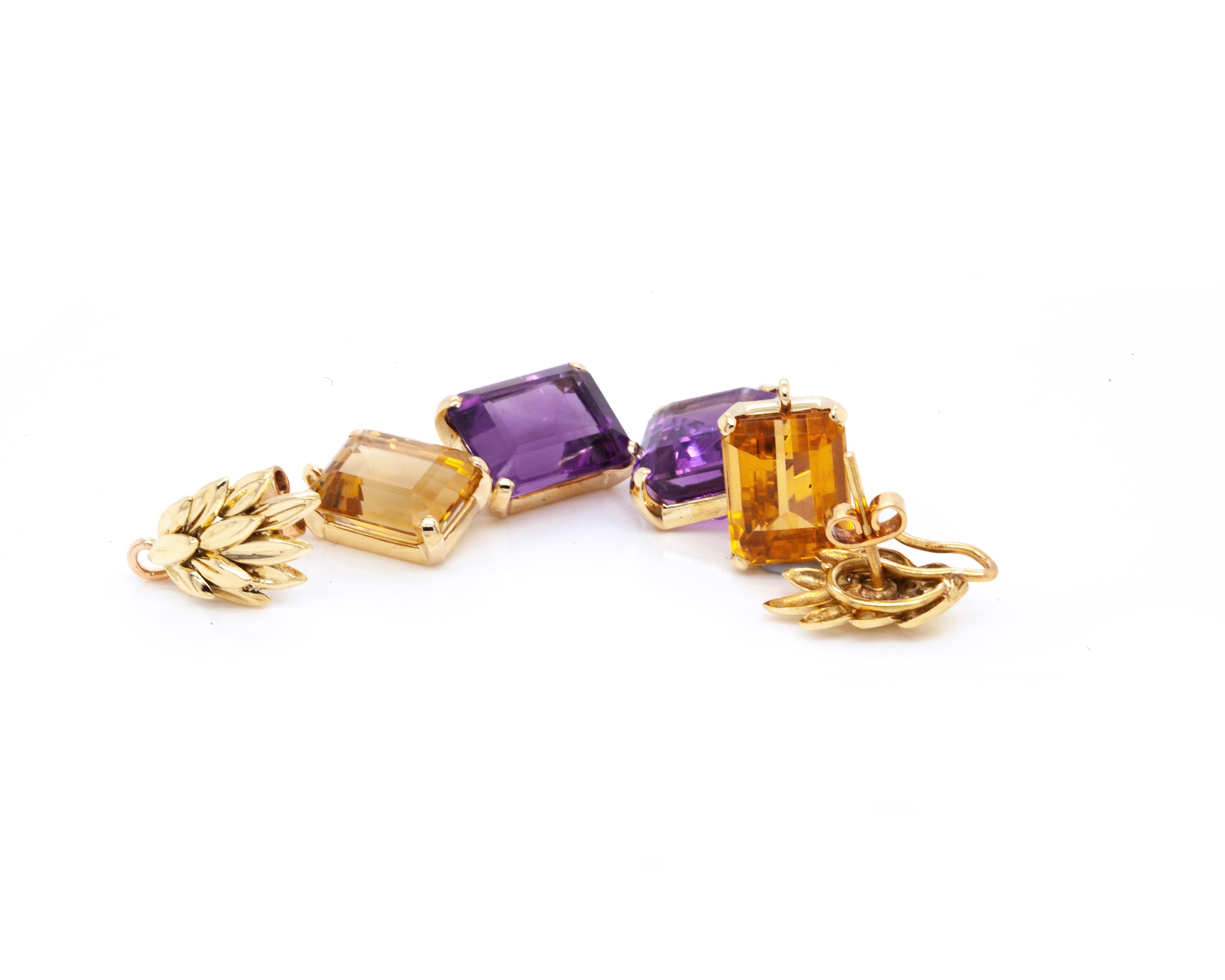 No podrás evitar enamorarte de estos exquisitos y versátiles pendientes colgantes intercambiables.

La parte superior de los pendientes está diseñada con un intrincado motivo de hojas, delicadamente dispuestas en un patrón de capas, elaborado en oro