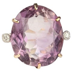 Anello vintage con ametista e diamante in oro 18 carati