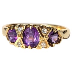 Vintage Amethyst and Diamond 18 Carat Gold Three-Stone Ring