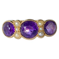 Vintage Amethyst and Pearl 18 Carat Gold Three-Stone Ring