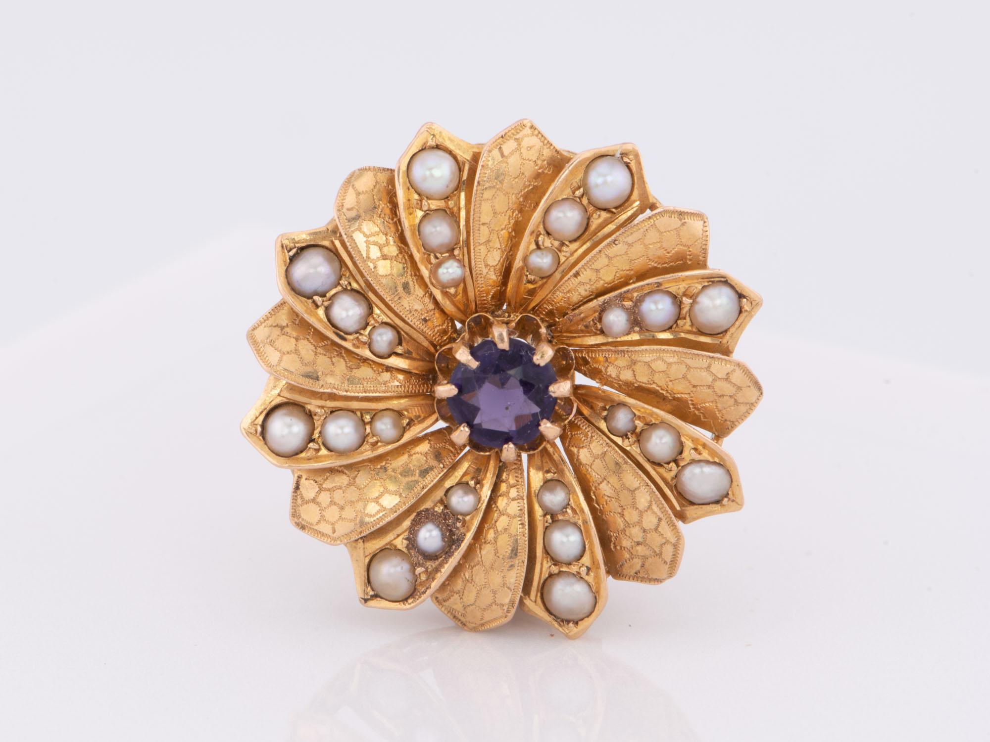 This exquisite 14K gold brooch features a unique spiral flower design encrusted with delicate seed pearls and a beautiful amethyst in the center, making it a truly eye-catching piece of jewelry that any fashionista would love. This luxurious brooch