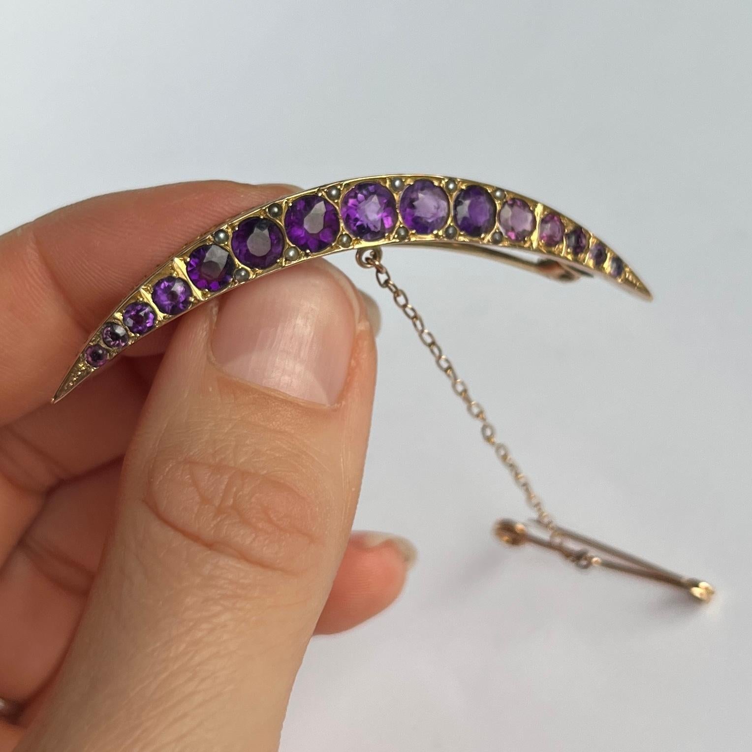 This stylish crescent brooch holds a total of 15 amethyst. The brooch is modelled out of 9carat gold. Stone diameter vary from 5.5-1.5mm.


Brooch Dimensions: 6x1.5cm

Weight: 5g