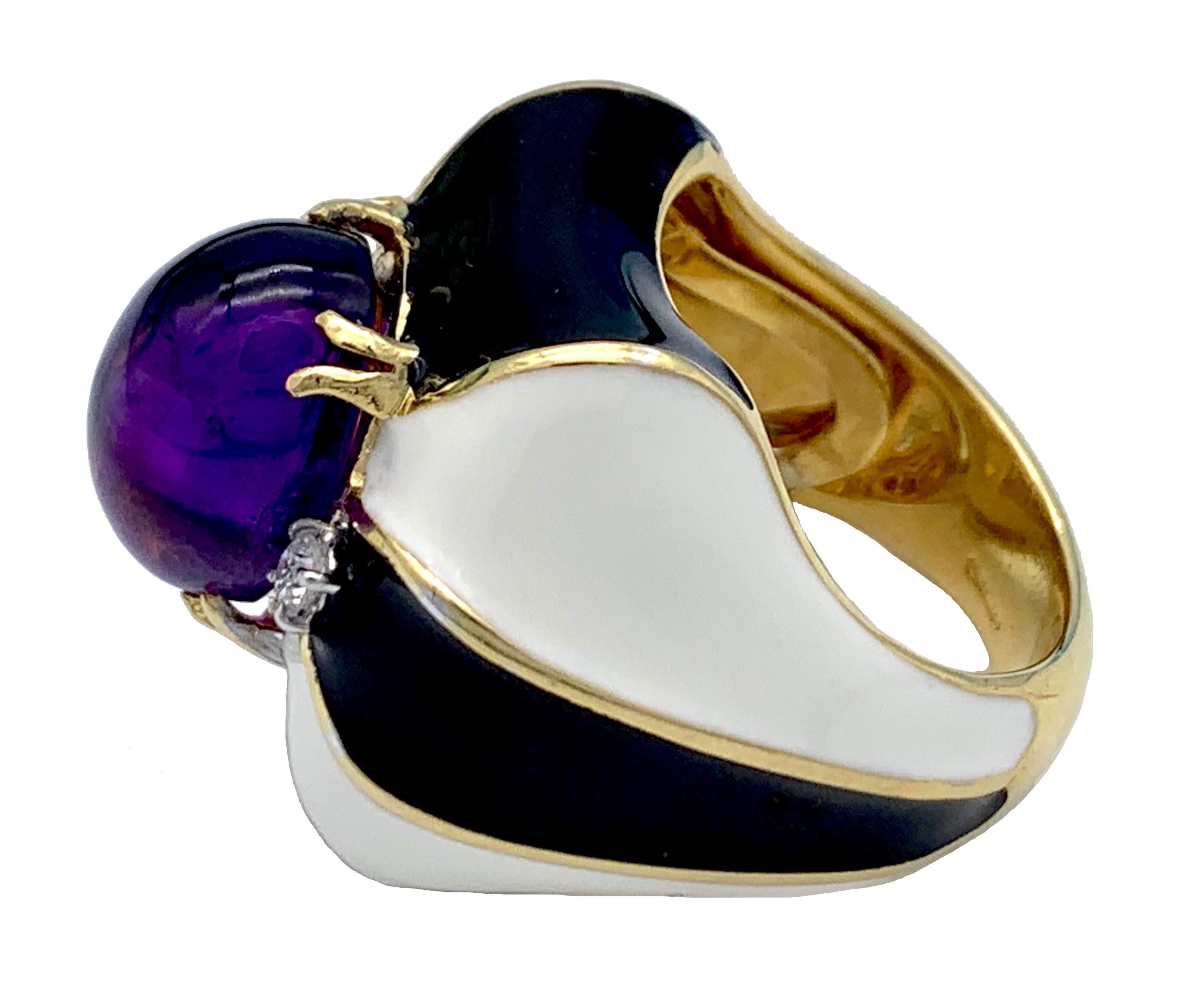 This stunning cocktail ring has been crafted by Graser of Treviso  out of 18 carat yellow and white gold. It is decorated with black and ivory coloured enamel and highlighted by an oval amethyst cabochon and 2  diamonds. 

Ring size: between  US