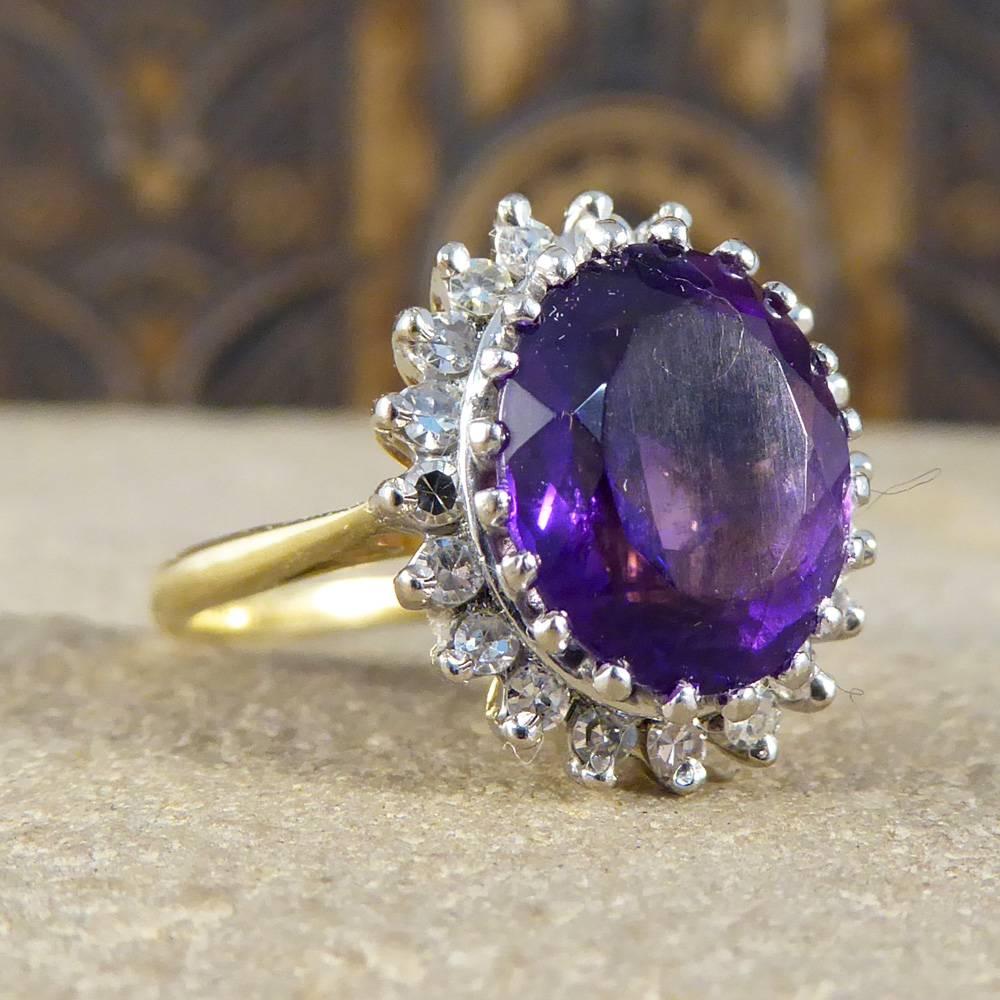 This bold and beautiful vintage ring features a 2.9ct amethyst surrounded by diamonds.
Set in 18ct yellow gold, it is a true standout piece that will add a perfect pop of purple to your outfit!

Ring Size: UK J 1/2 or US 5

Condition: Very Good,