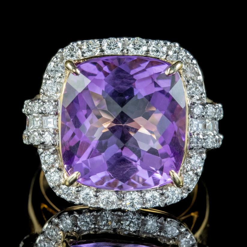 An extravagant cocktail ring from the late 20th Century adorned with a breath taking briolette cut amethyst weighing approx. 12ct. It has a desirable, regal purple hue and glistens with many expertly cut facets.

The centre stone is claw set in a