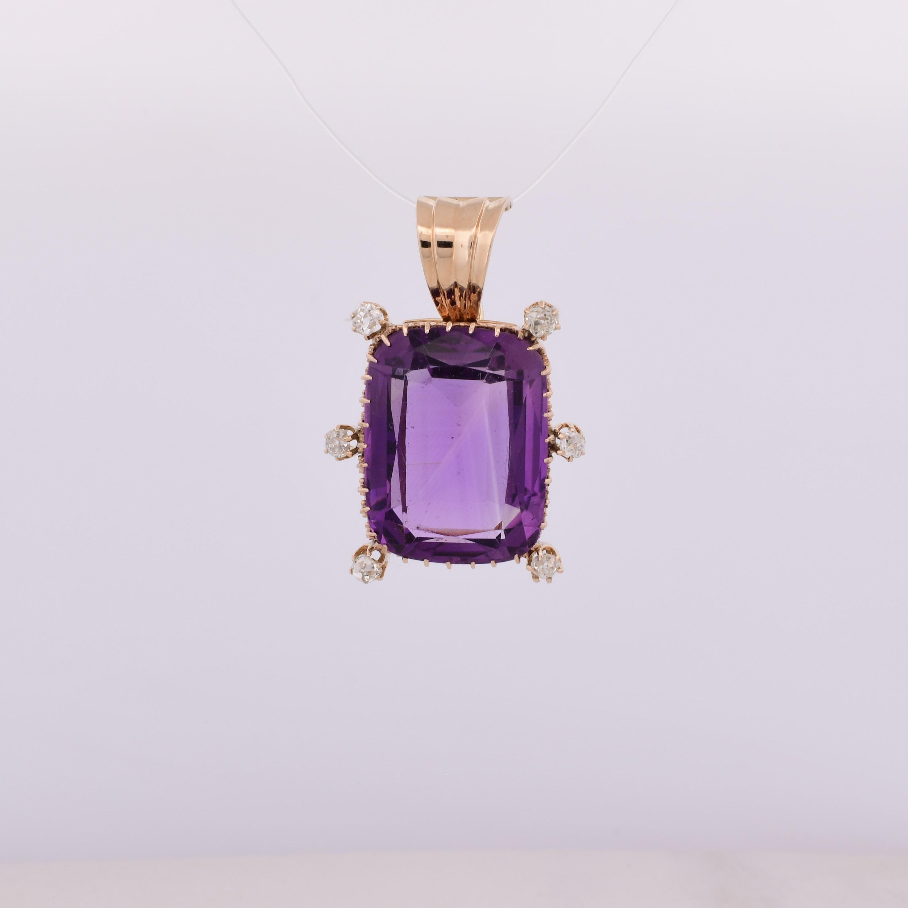 This Vintage Amethyst and Old Mine Cut Diamond 14K Gold Custom Pendant exudes timeless allure and sophistication. The rich, violet-hued amethyst gemstone commands attention, encircled by 6 meticulously crafted Old Mine cut diamonds that shimmer with