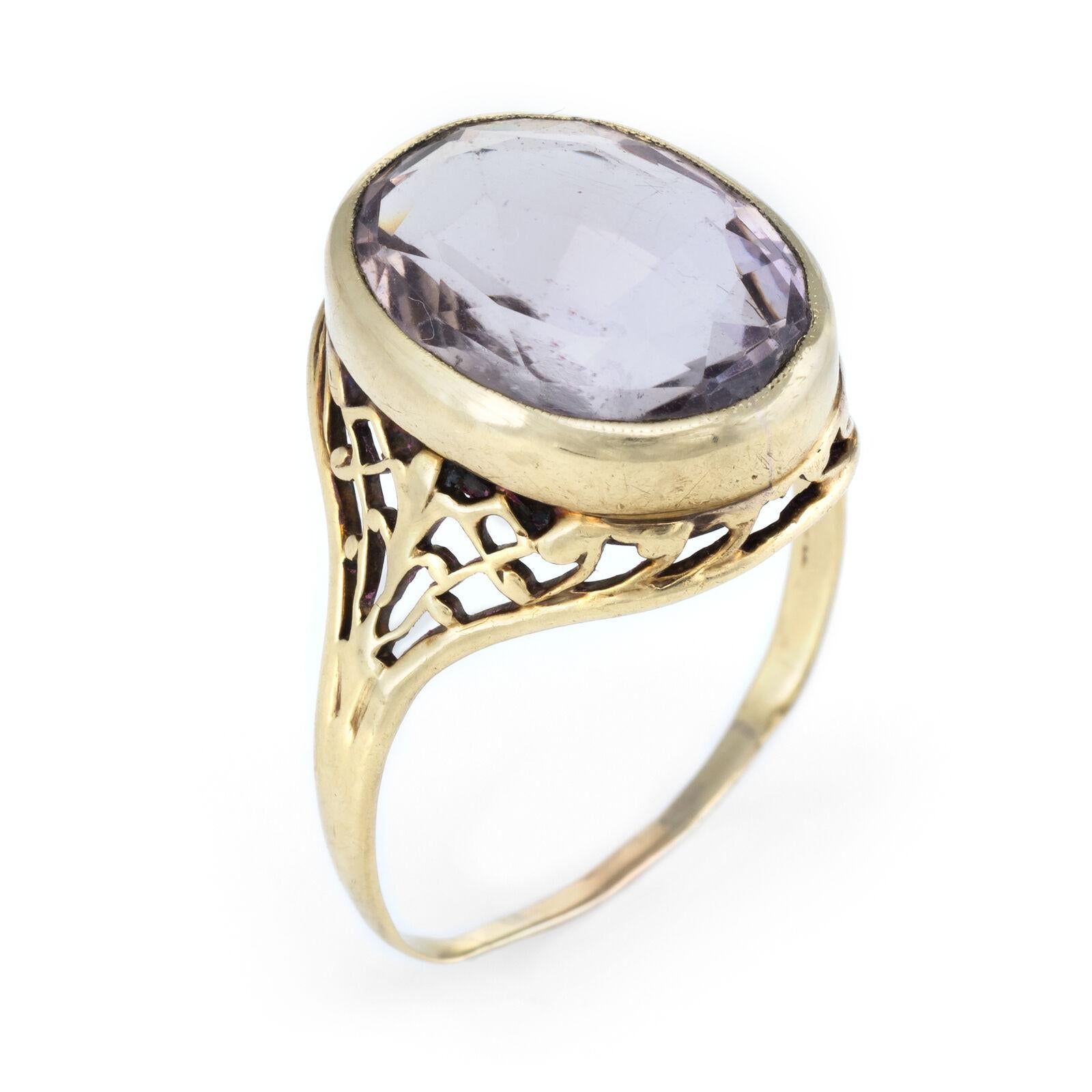 Distinct & stylish amethyst cocktail ring (circa 1950s to 1960s), crafted in 14 karat yellow gold. 

Faceted oval cut amethyst measures 14mm x 11mm (estimated at 7 carats). The amethyst is in excellent condition and free of cracks or chips. 

Bold