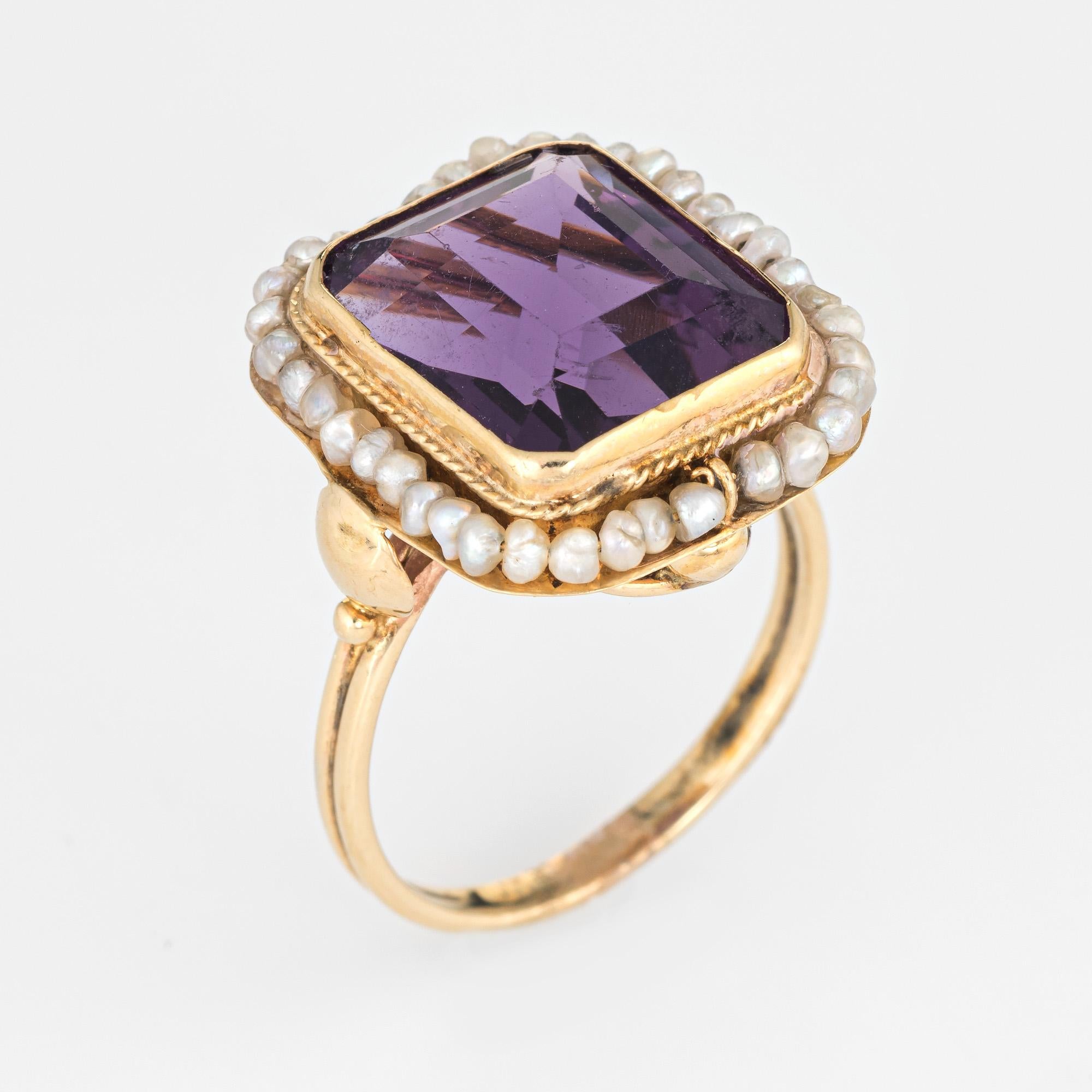Stylish vintage amethyst cocktail ring (circa 1950s to 1960s) crafted in 14 karat yellow gold. 

Faceted square cut amethyst measures 13mm x 11mm (estimated at 8.50 carats), accented with natural seed pearls. Note: slight chip to the amethyst
