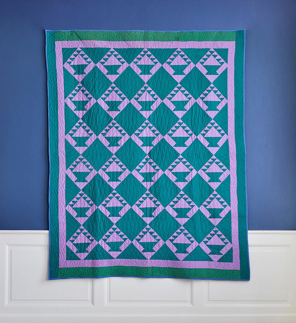 Vintage authentic cotton Amish baskets antique quilt from 1930s. Amish green and lilac/lavender baskets quilt is precisely treadle machine pieced and hand quilted. 
It is in excellent condition, with a couple of light, inconspicuous spots, and no