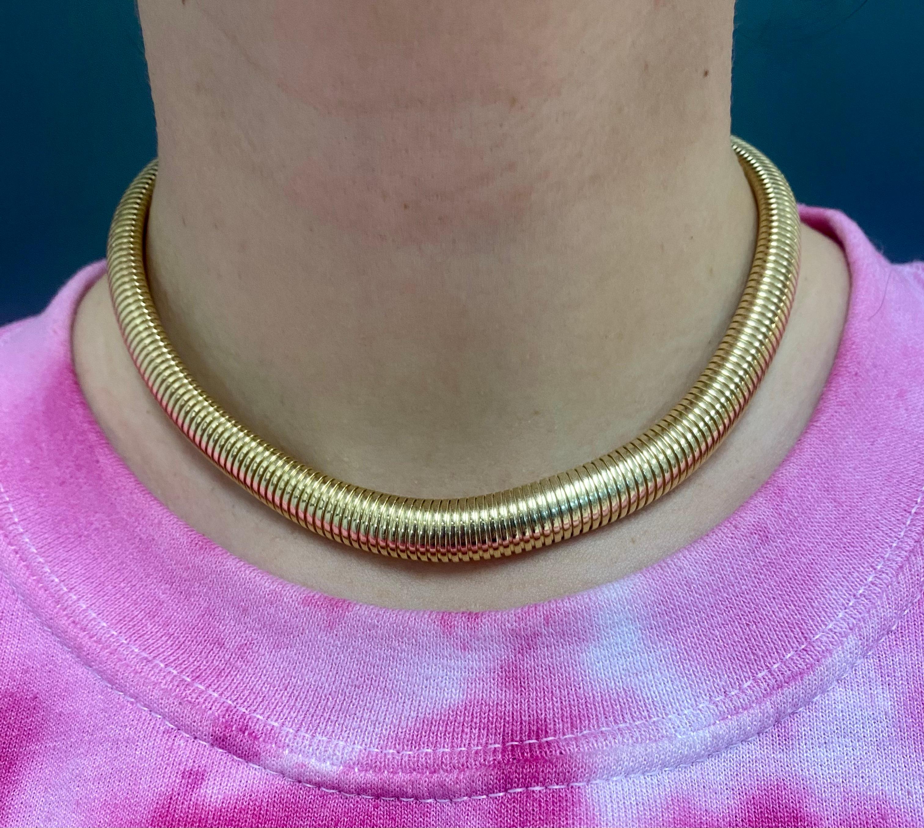 Designer: Amoro Yaffa
Materials: 14 karat yellow gold
Weight: 35.7 grams
Measurement: 15 inches long and 3/8 inches wide
Hallmarks: Amoro Yaffa 14Kt Italy

A gorgeous Amoro Yaffa tubogas choker necklace made of 14k gold. 	The necklace is signed by