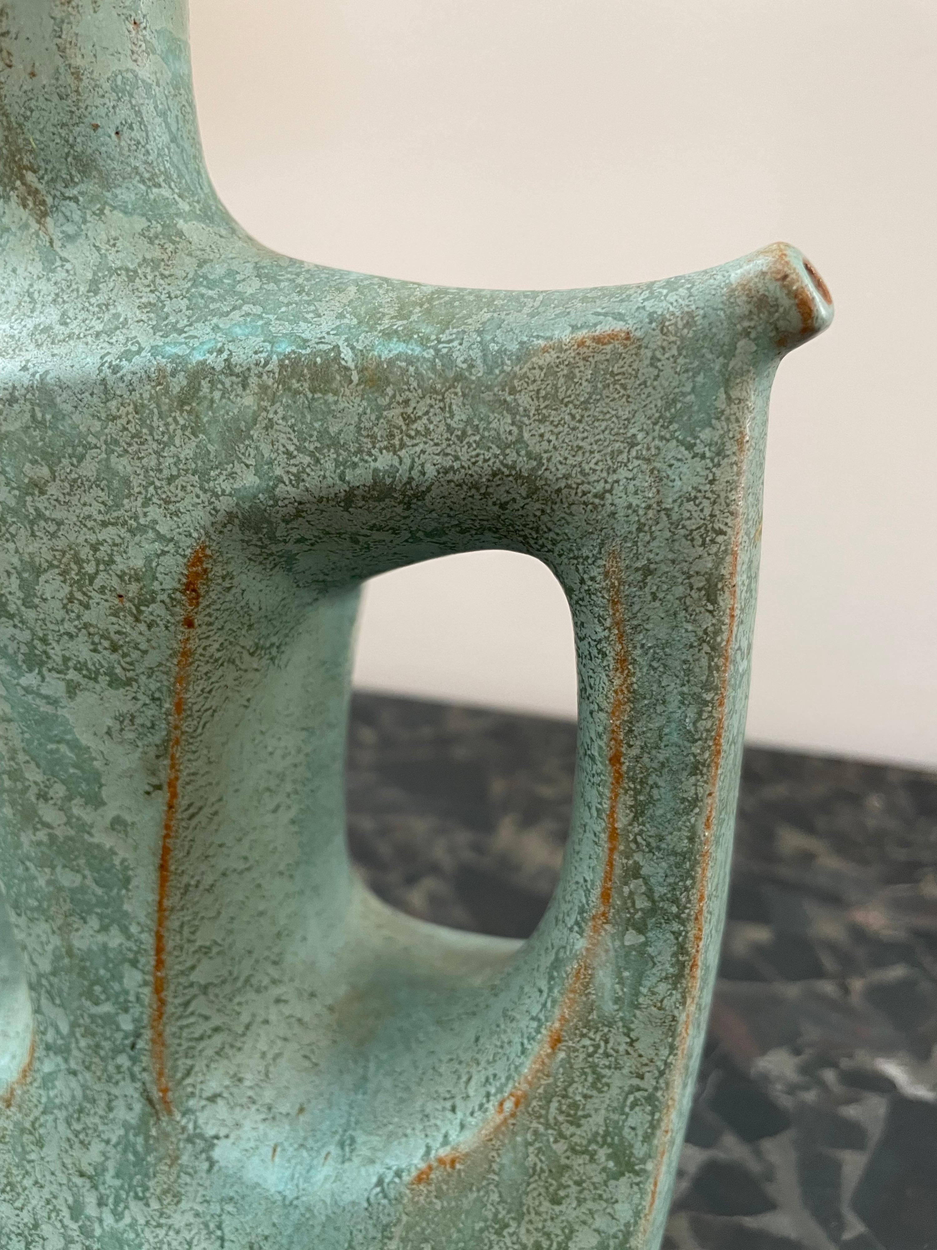 This rare and beautiful mid-century amphora pottery in a soft turquoise tone.