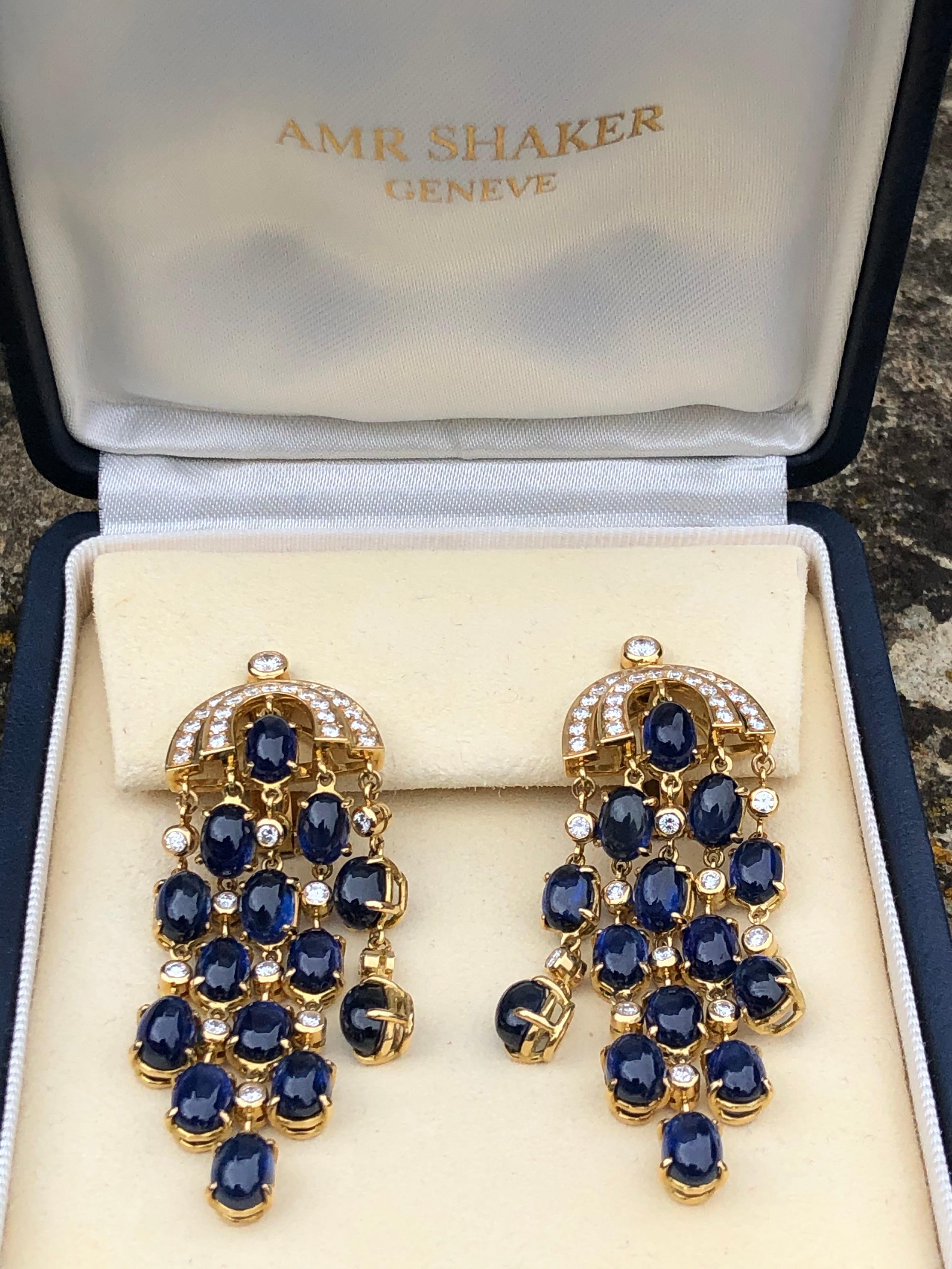 These earrings are sure show stoppers! They have sparkle with the diamonds and the sapphire cabochon stones are a fabulous blue colour. Each drop from the diamond encrusted semi circle is free to sway with movement and catch the light beautifully.