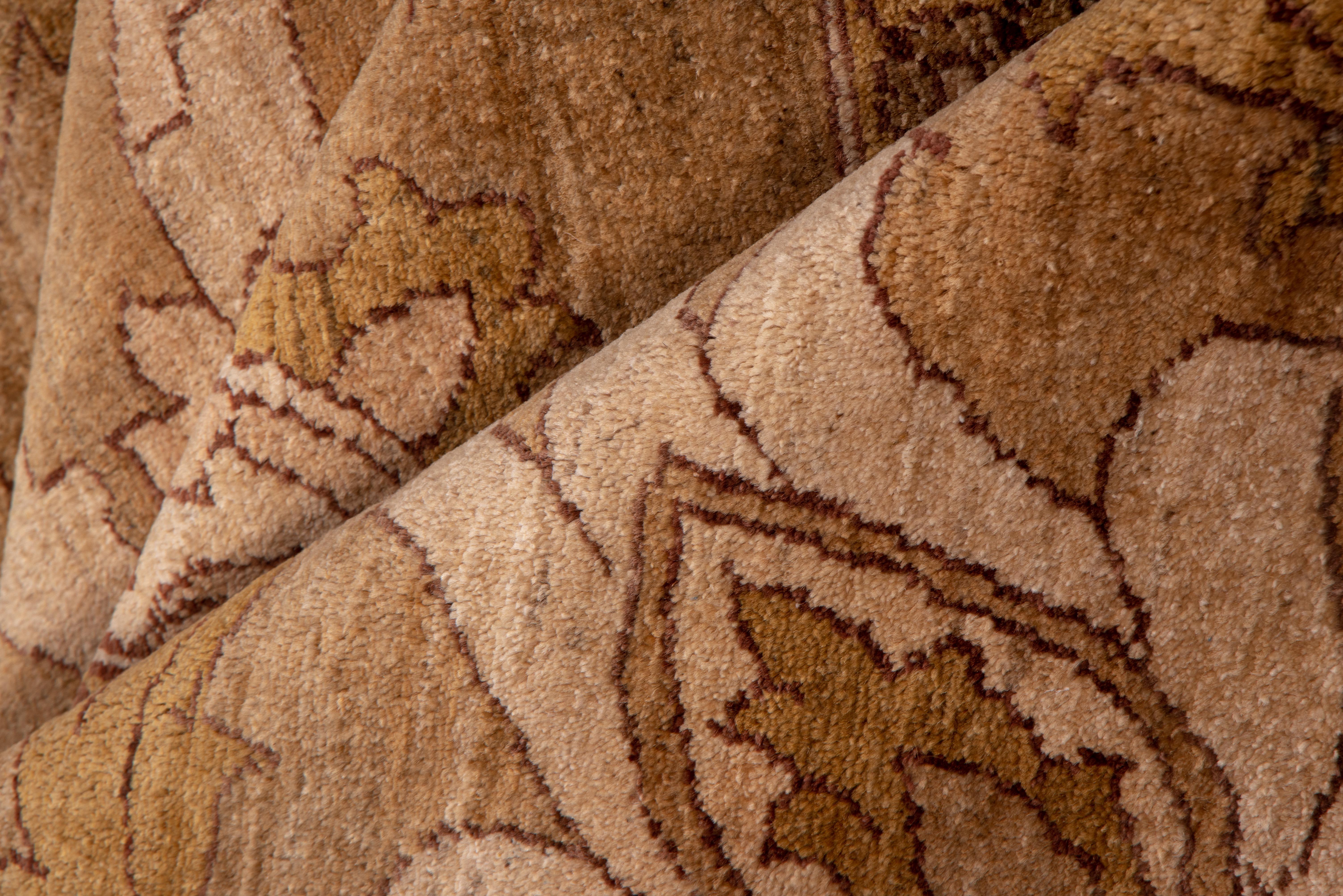 This vintage Amritzar rug exudes earthy refinement through its warm umber-toned field adorned with elegant scrolling vines, stylized lotus palmettes, and symmetric rosettes in soft taupe, wheat, and faded almond. The layered botanical motifs are