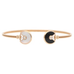 Amulette de Cartier, bracelet ouvert vintage en or rose