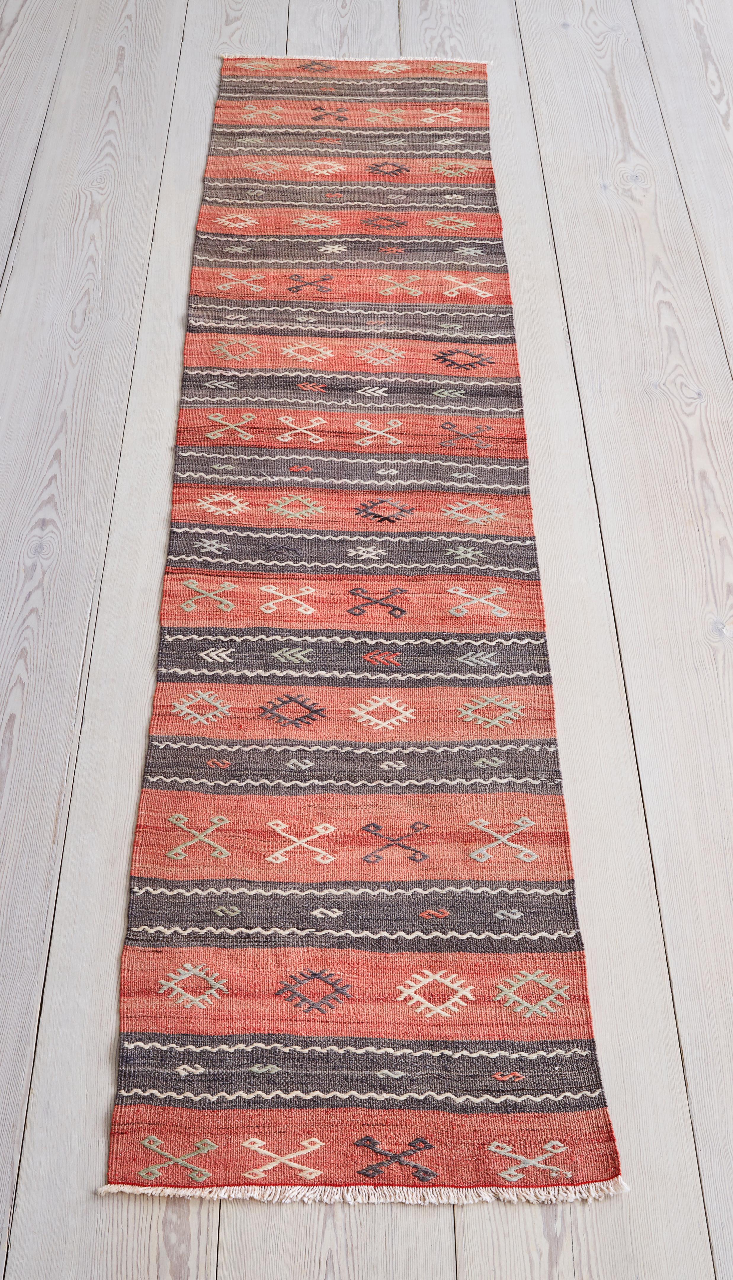 Colorful vintage Anatolian runner with a beautiful pattern.