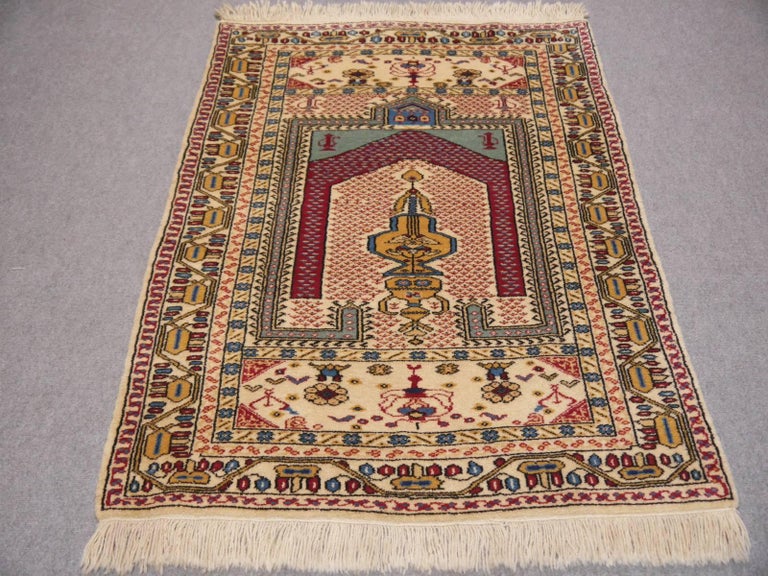 Semi antique turkish prayer rug. This beauty was used as a wall hanging vor almost 50 years - it has no wear, defects or anything else. It is 