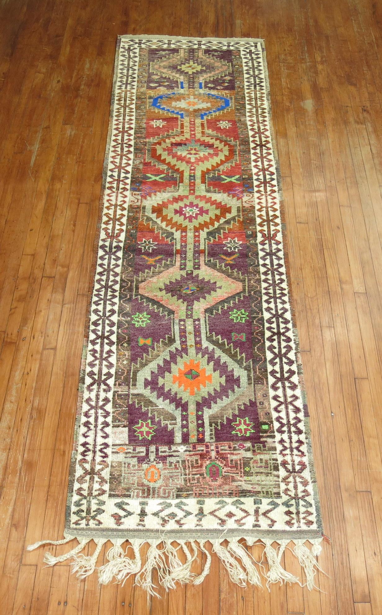 One of a kind colorful 20th century handwoven Turkish runner. Professionally washed and personally vetted. Ready for everyday use.