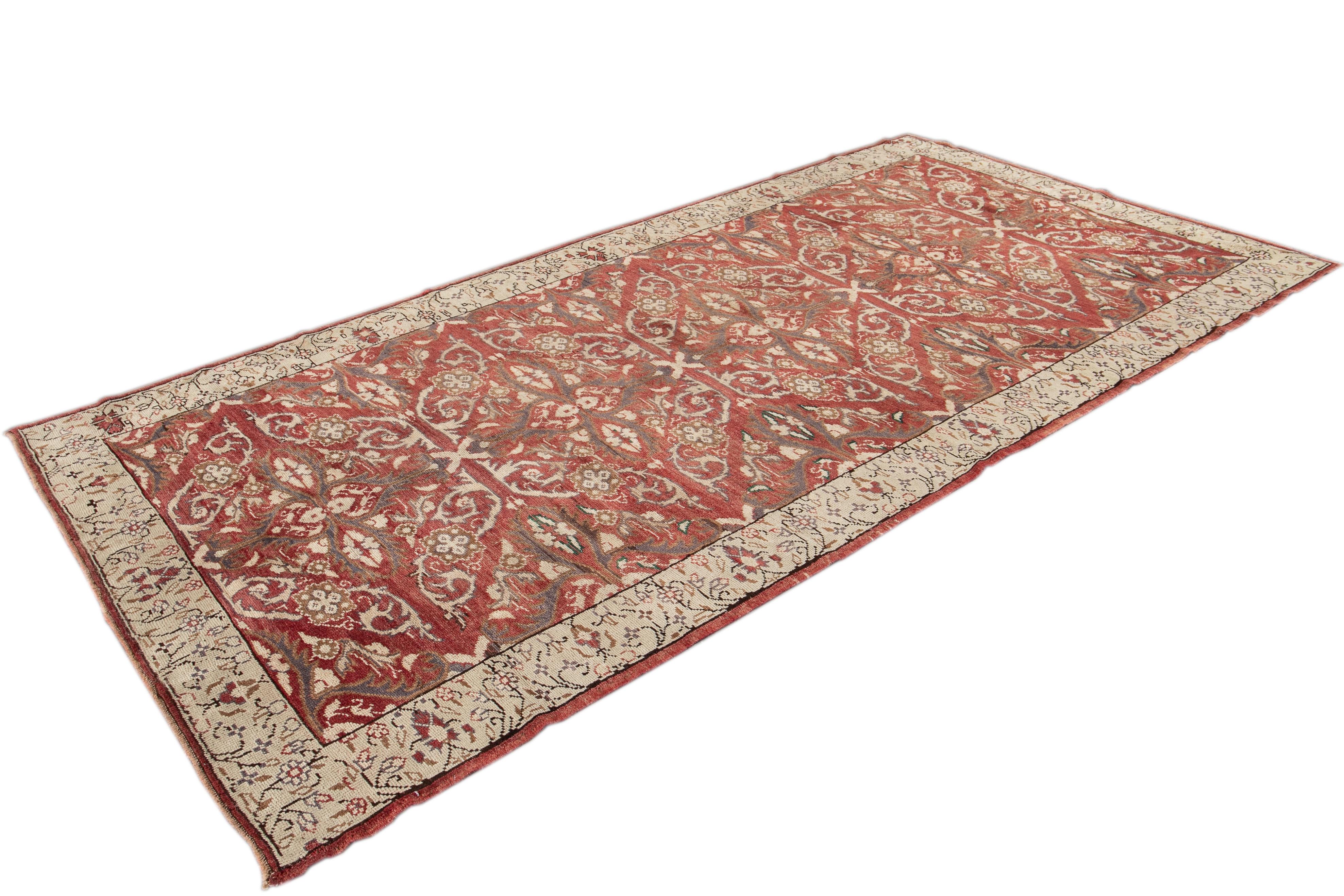 Beautiful Anatolian Runner with a rust field and ivory accents with detailed designs all-over the rug. 

This rug measures 5' 4