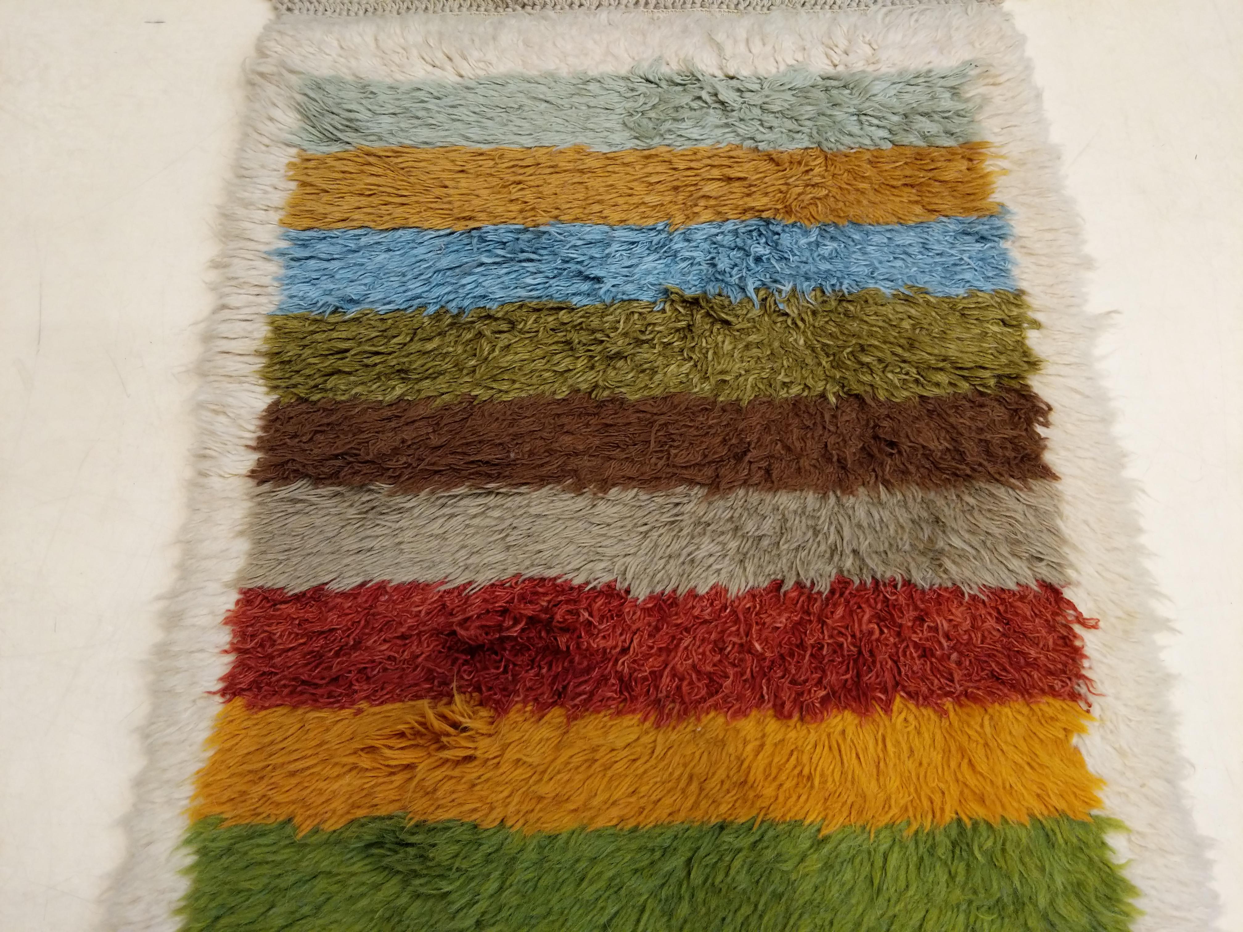 Wool Vintage Anatolian Tulu Narrow Runner Rug with Polychrome Stripes For Sale