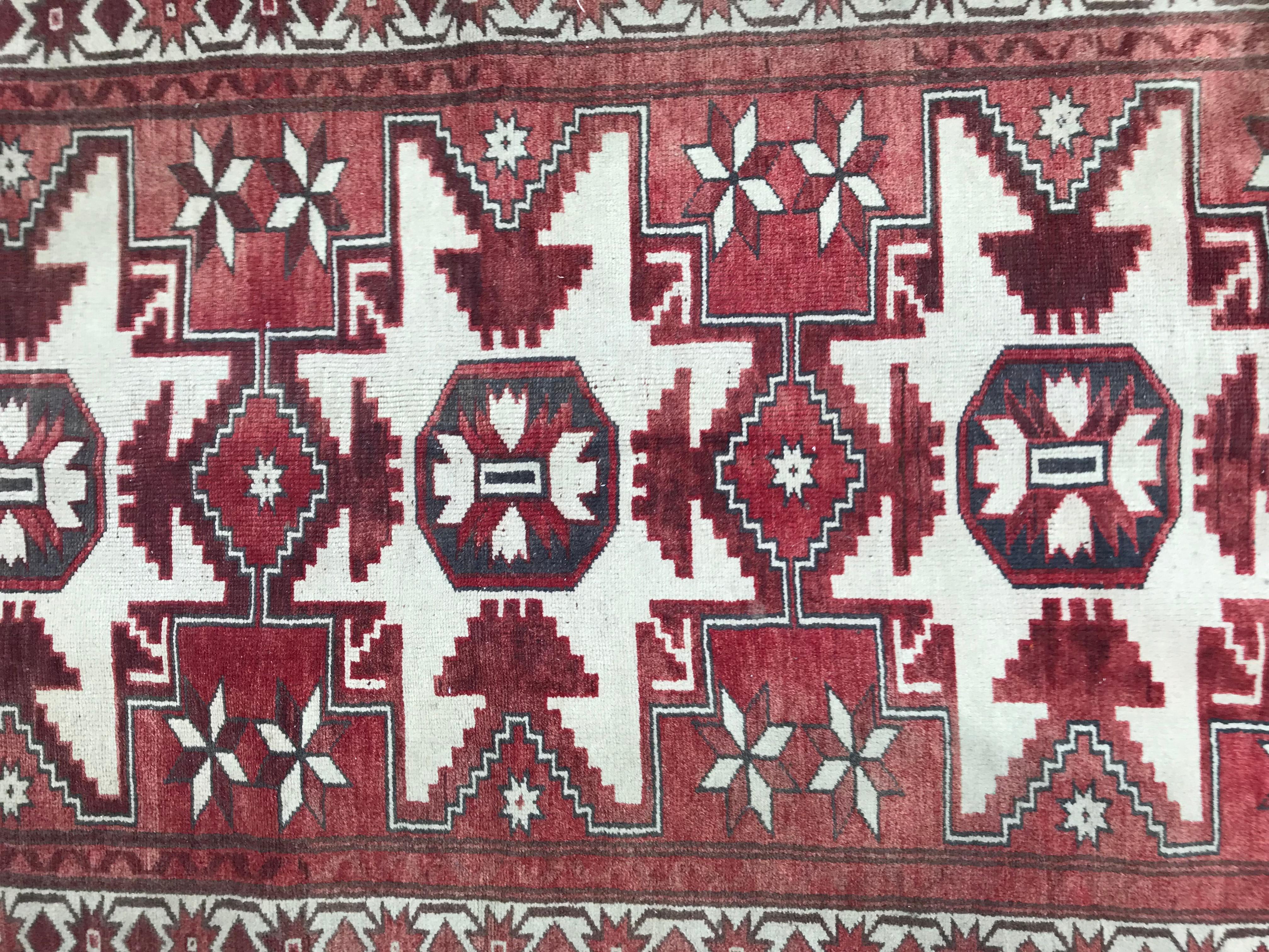 20th century Turkish Konya rug with geometrical Caucasian design entirely hand knotted with wool velvet on wool foundation.
 