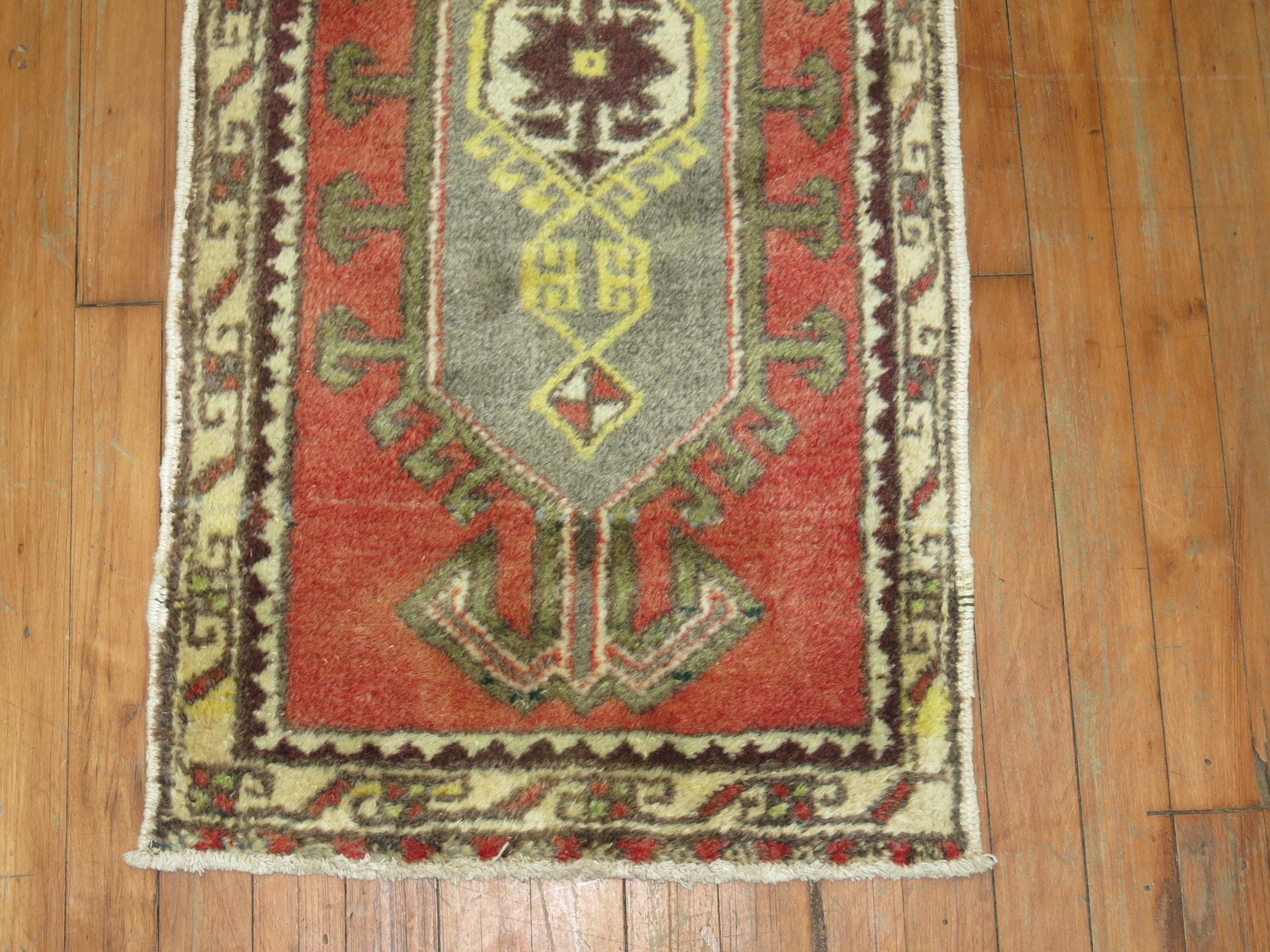 A vintage Anatolian Turkish Yastik rug.