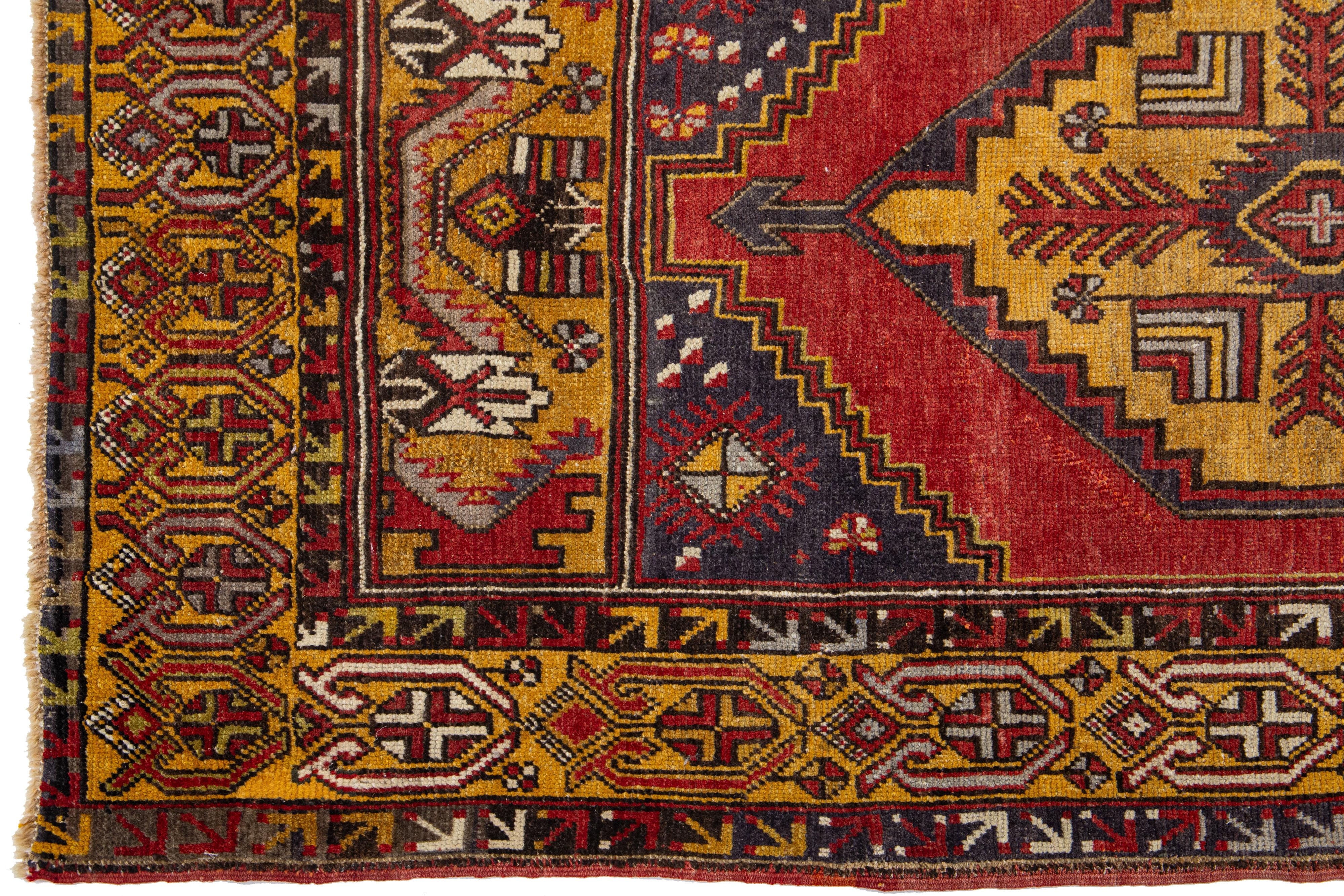 Hand-Knotted Vintage Anatolian Wool Rug With Geometric Motif In Multicolor   For Sale