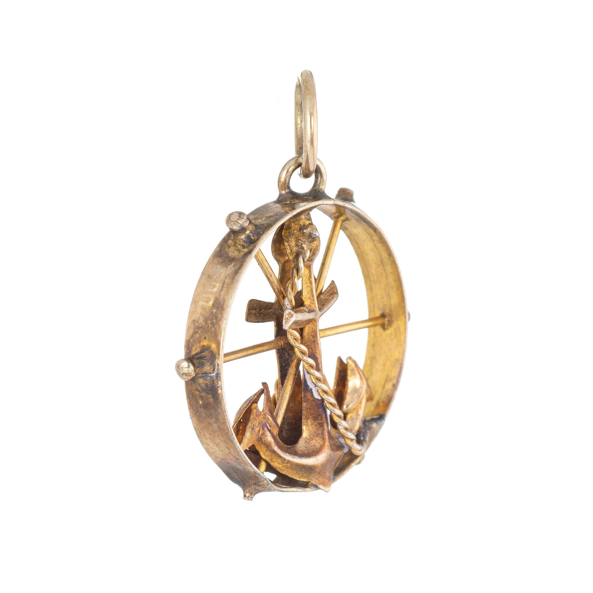 Finely detailed vintage nautical charm crafted in 14k yellow gold.  

The anchor is set within a ships wheel. Ideal worn as a pendant or on a charm bracelet. 

The pendant is in good condition with patina evident (we have not cleaned it in order to