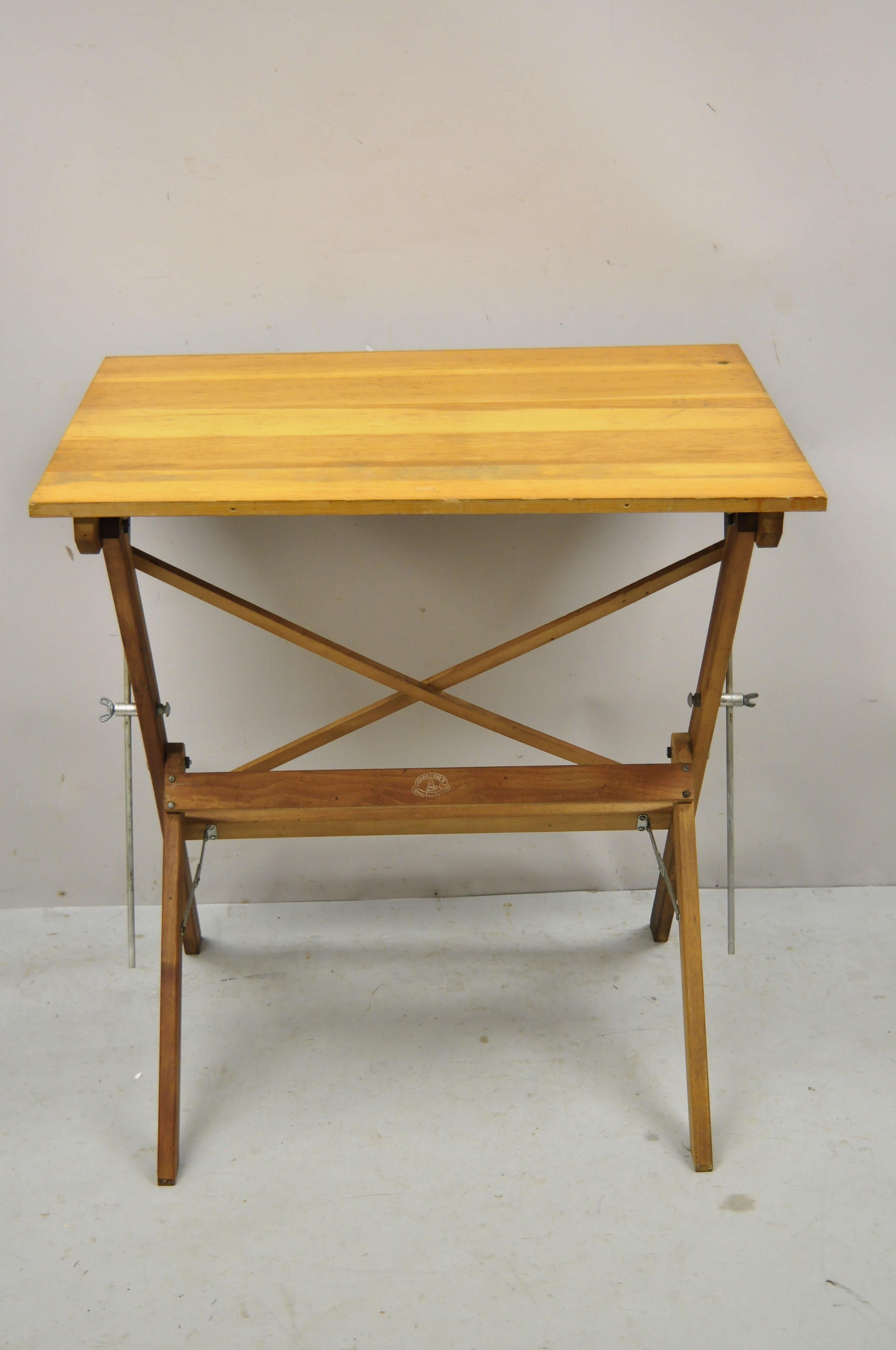 Vintage Anco Bilt small wooden architect drafting table folding work table stand. Item features fold up frame, solid wood construction, beautiful wood grain, original label, quality American craftsmanship. Nice small size. Circa Late 20th Century.