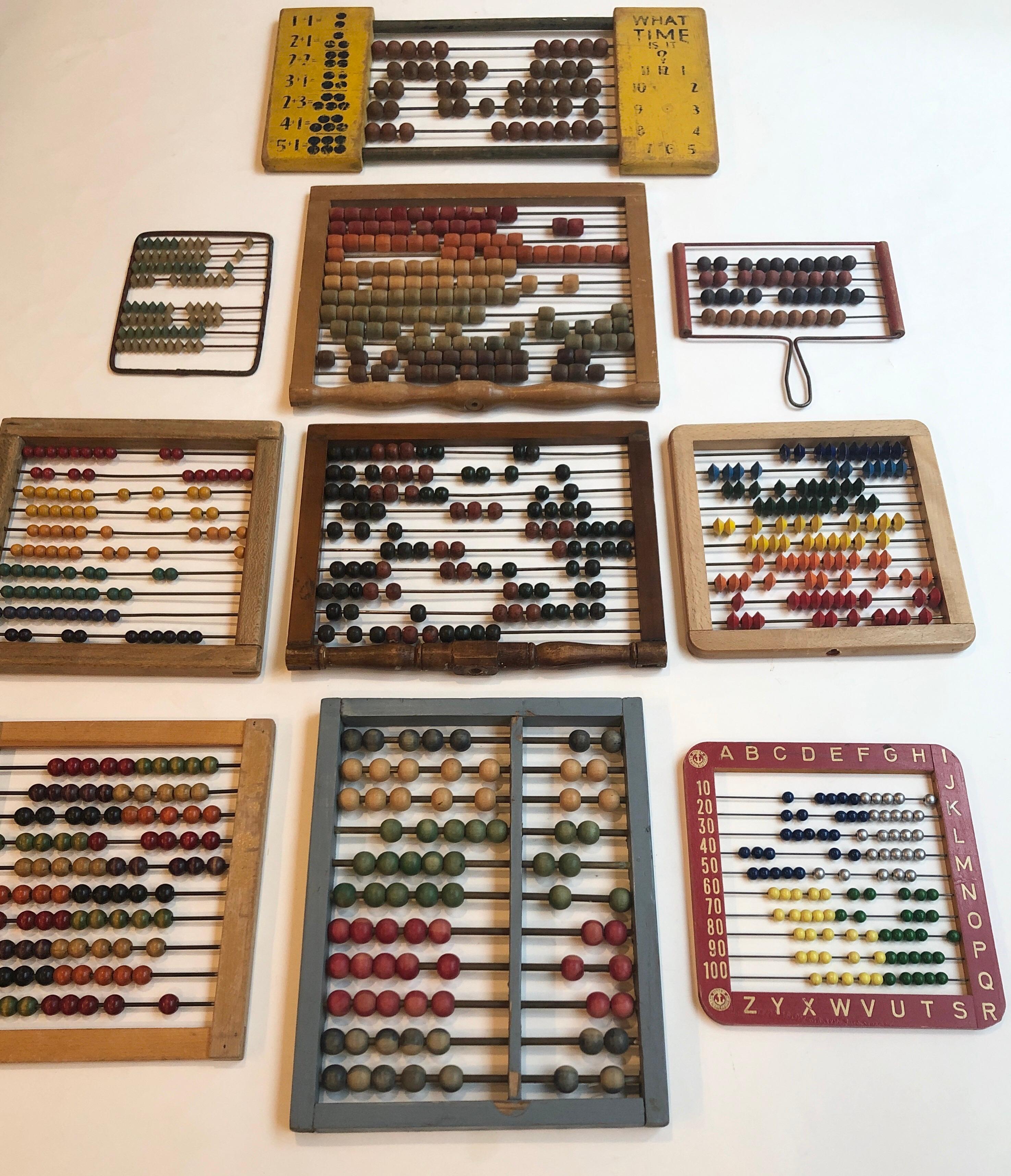 A colorful collection of 10 antique and vintage Mid-Century Modern children's abacus collection in various shapes, sizes and colors. The smallest being 6.5