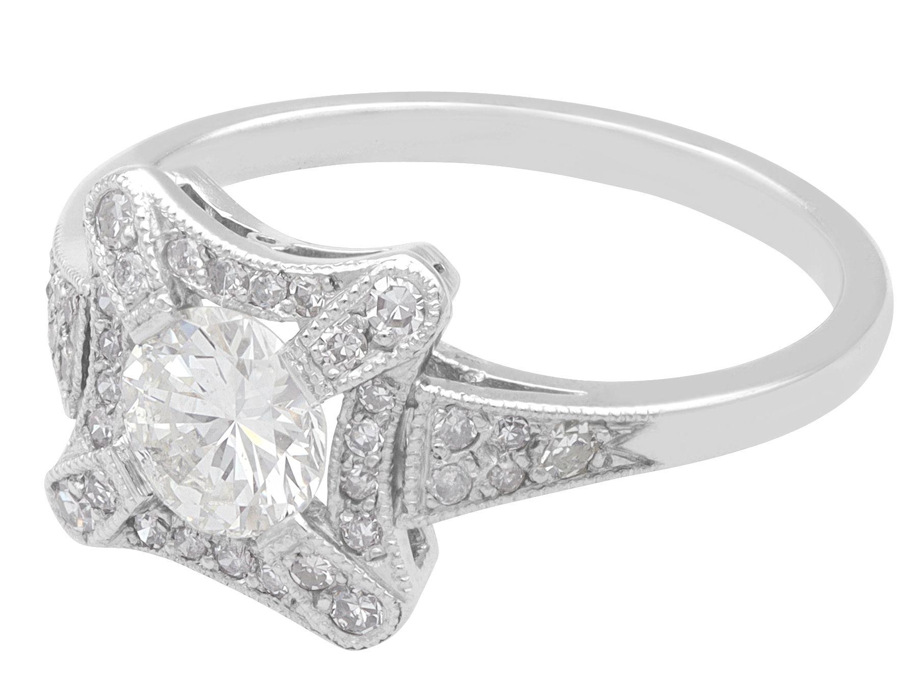 Round Cut 1.01 Carat Diamond and Platinum Cluster Ring For Sale