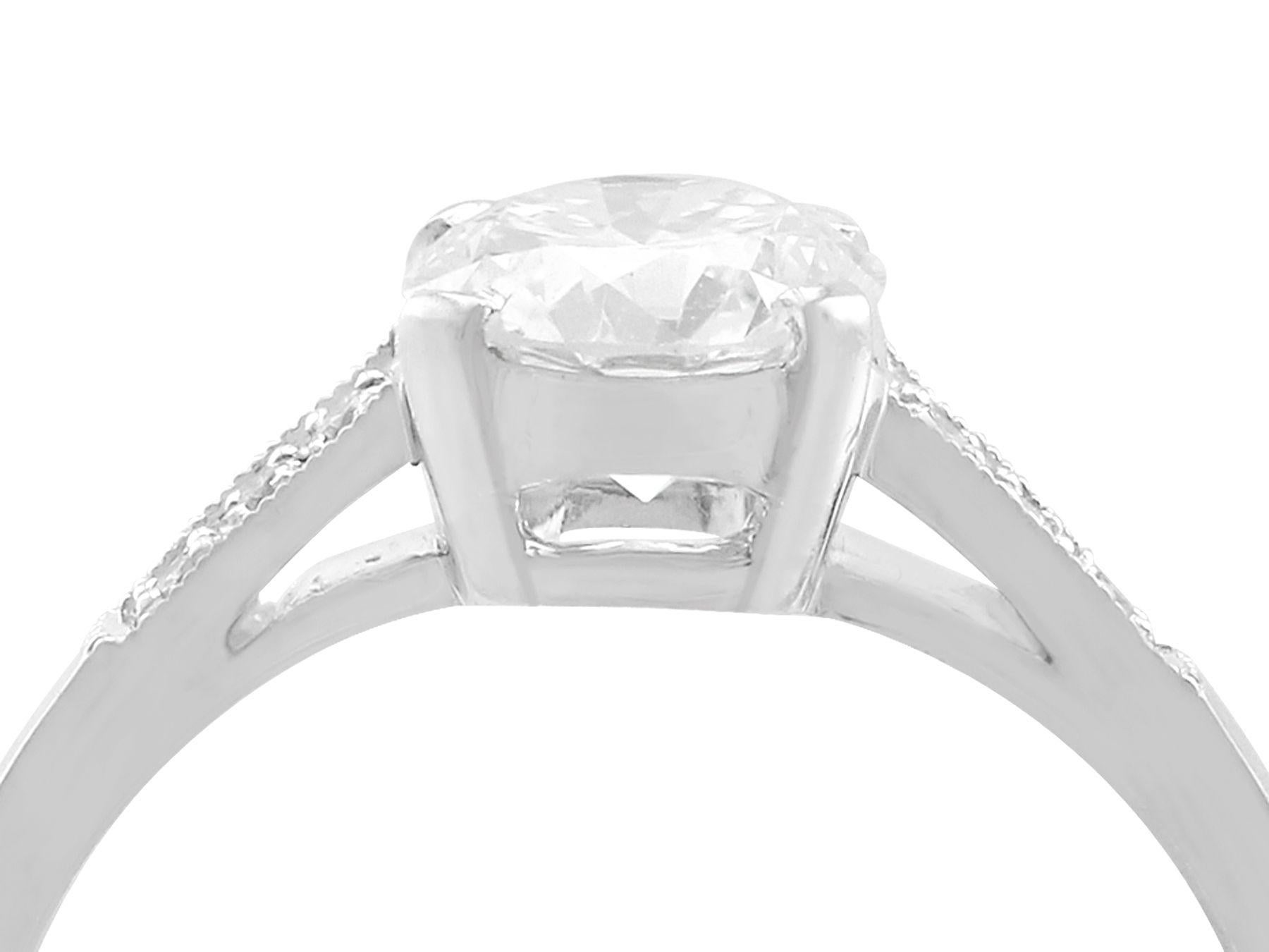 A stunning, fine and impressive vintage 1.02 carat diamond (total) and contemporary platinum solitaire ring; part of our diamond jewelry/estate jewelry collections.

This fine and impressive 0.96 carat diamond ring has been crafted in platinum.

The