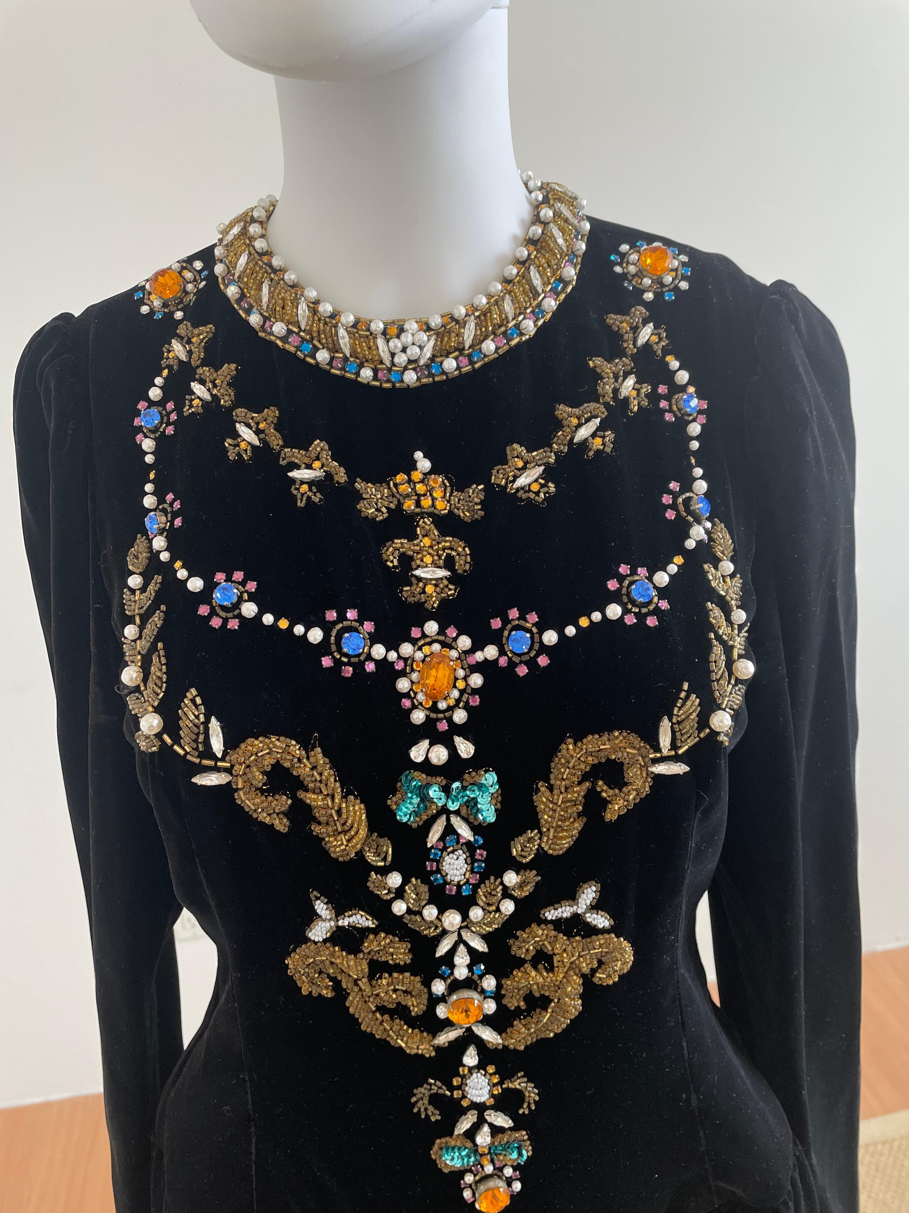 Vintage and Rare Oscar de la Renta Gown with Jeweled Neckline featuring crystals and pearls. This romantic velvet gown has gold embroidered along the neckline that will make you feel regal. Size US 10.