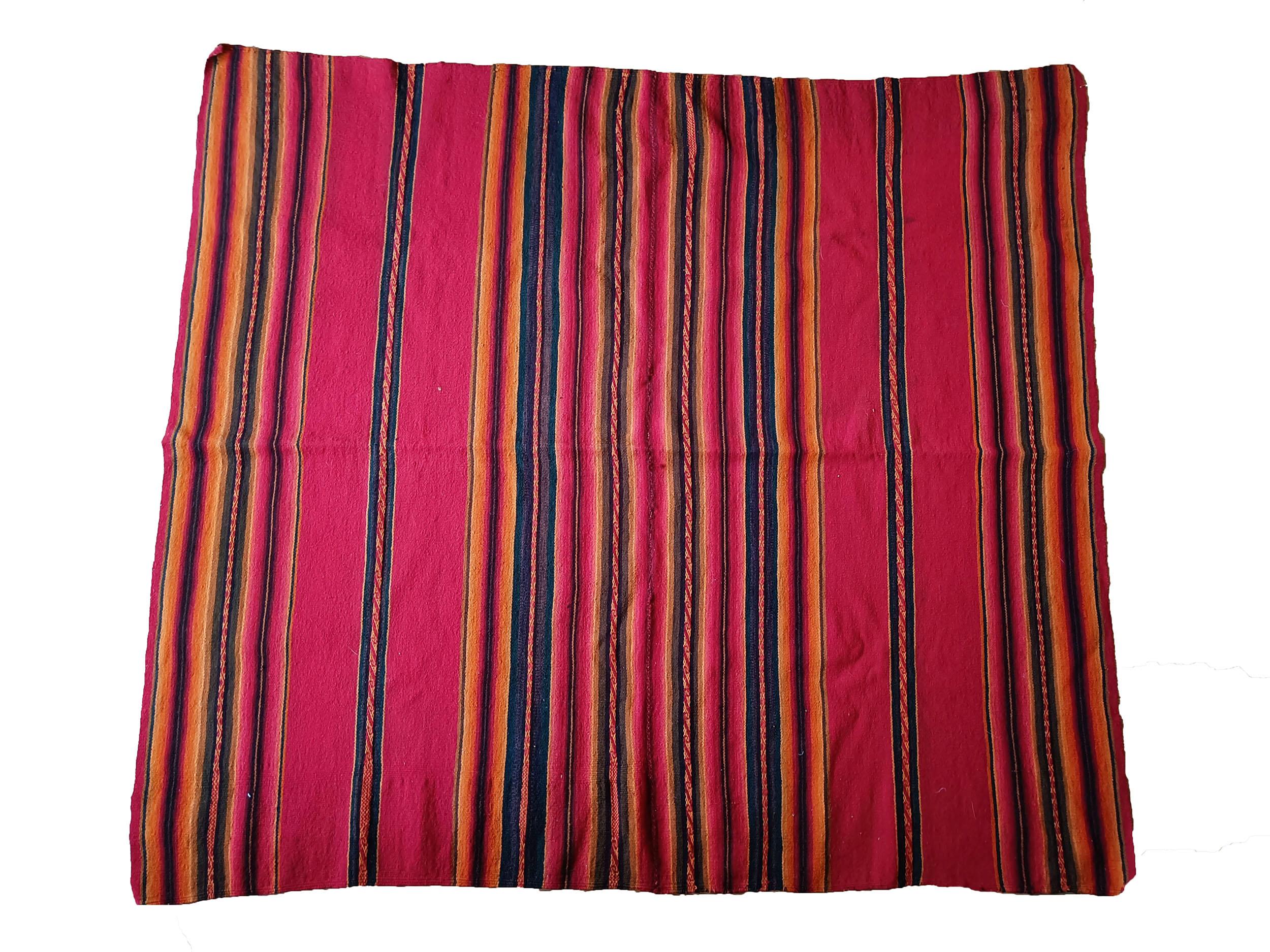 Vintage Andean Peruvian Manta Cloth South American Vintage Textiles.
A very fine Vintage Manta cloth from the High Andes region of Peru Woven in came-lid fibre (Llama wool )beautifully executed in natural dyed colors 
Fine condition, Period 1960's