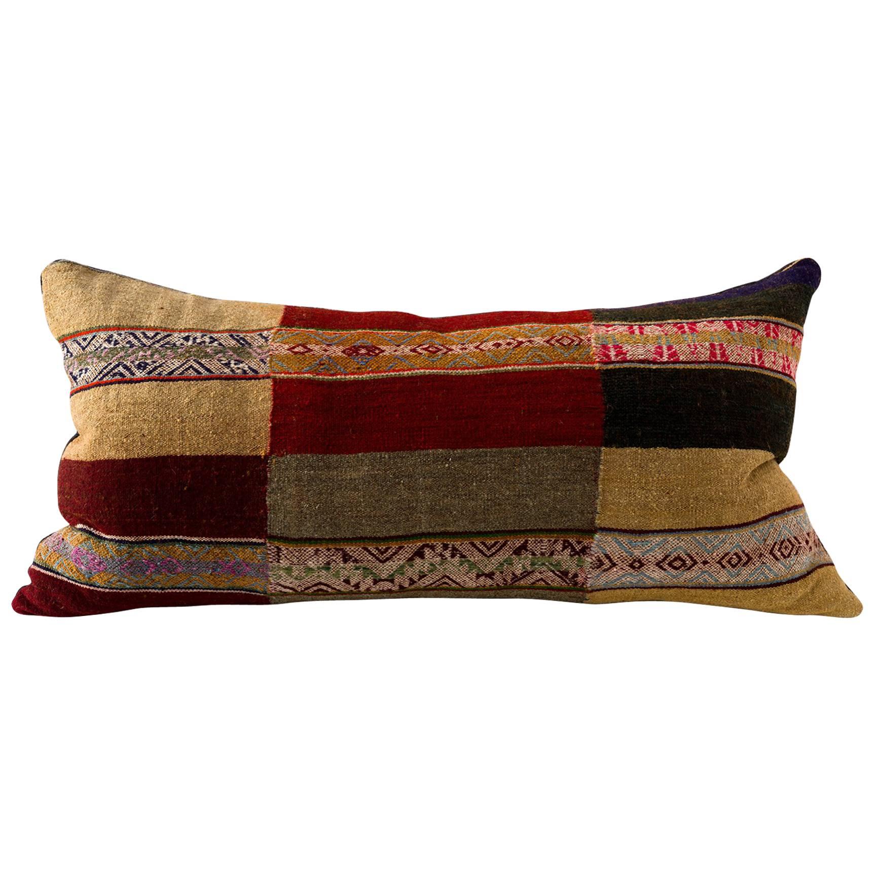 Vintage Andean Textile Cushion Reds Ochres Greens and Browns For Sale