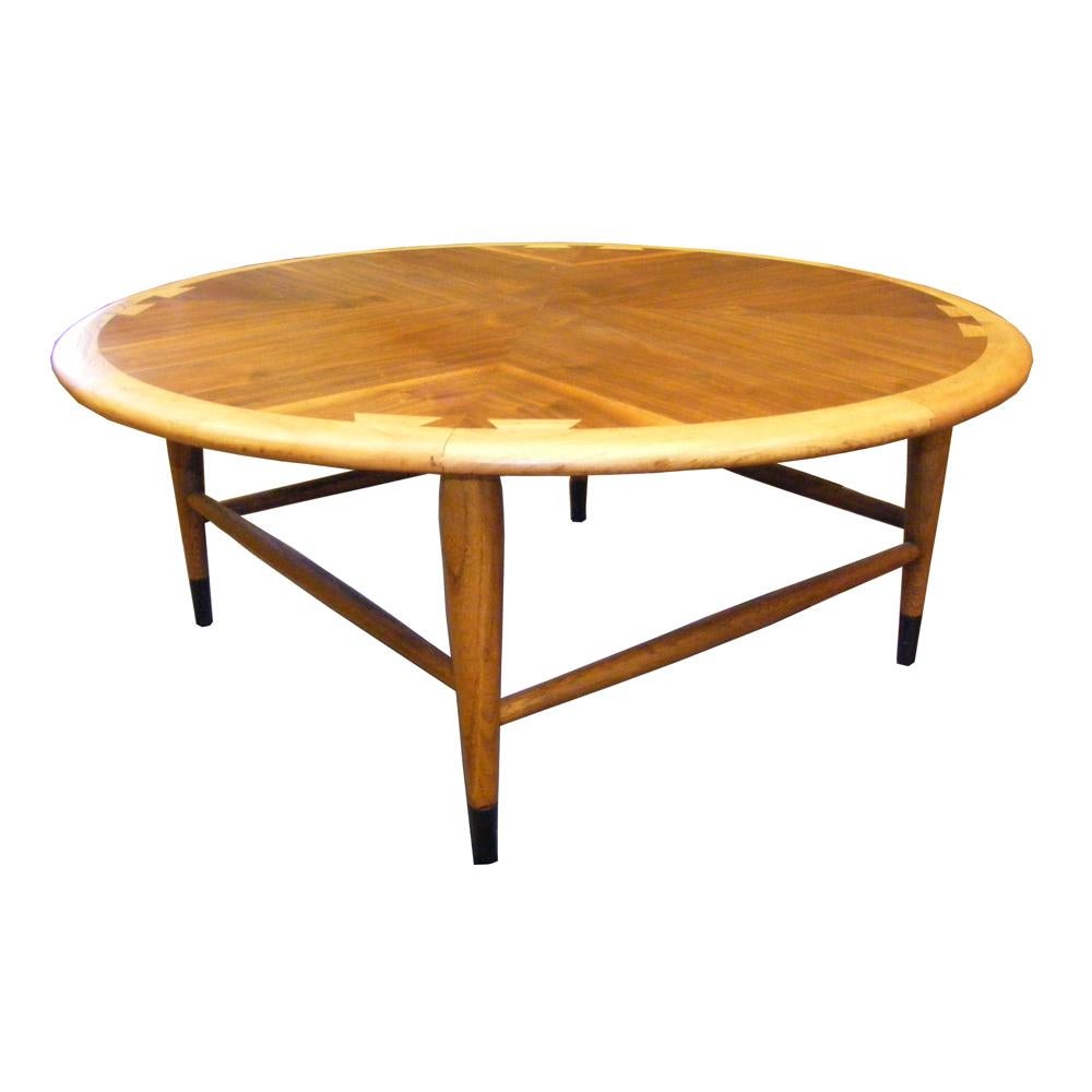 Vintage Lane Acclaim dove tailed walnut coffee table. Designed by Andre Bus this piece is great for living rooms with its Americanized Danish Mid-Century Modern aesthetic.