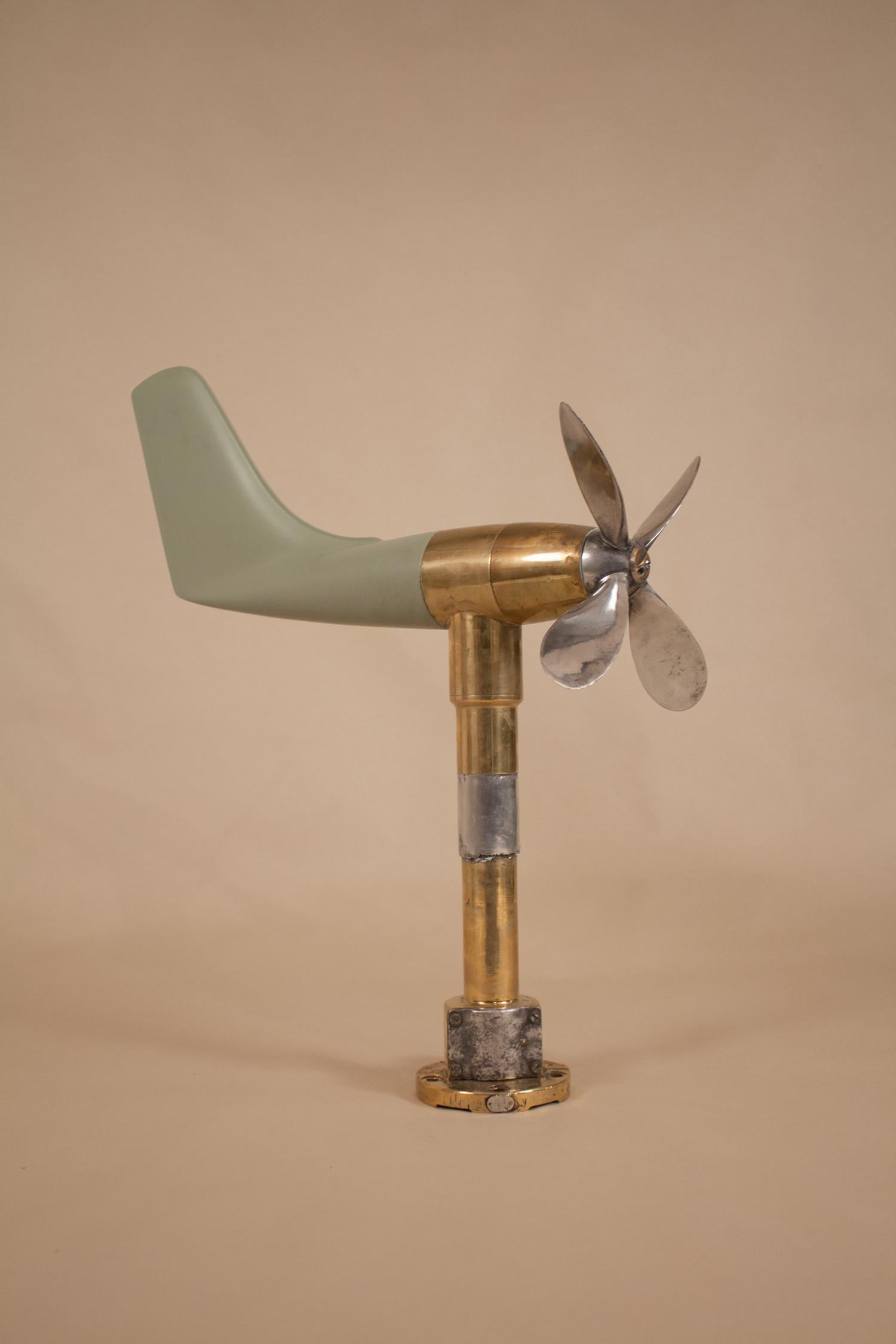 This 1950s anemometer, originally wired and used to measure wind speed and direction on an airfield or boat, now makes a delightful Kinetic sculpture. Whether wind- or manually-driven, the aluminium propeller, brass shaft and restored fiberglass