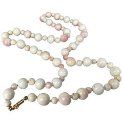  Necklace of Antique Angel Skin Coral Beads with a 14k Yellow Gold Clasp