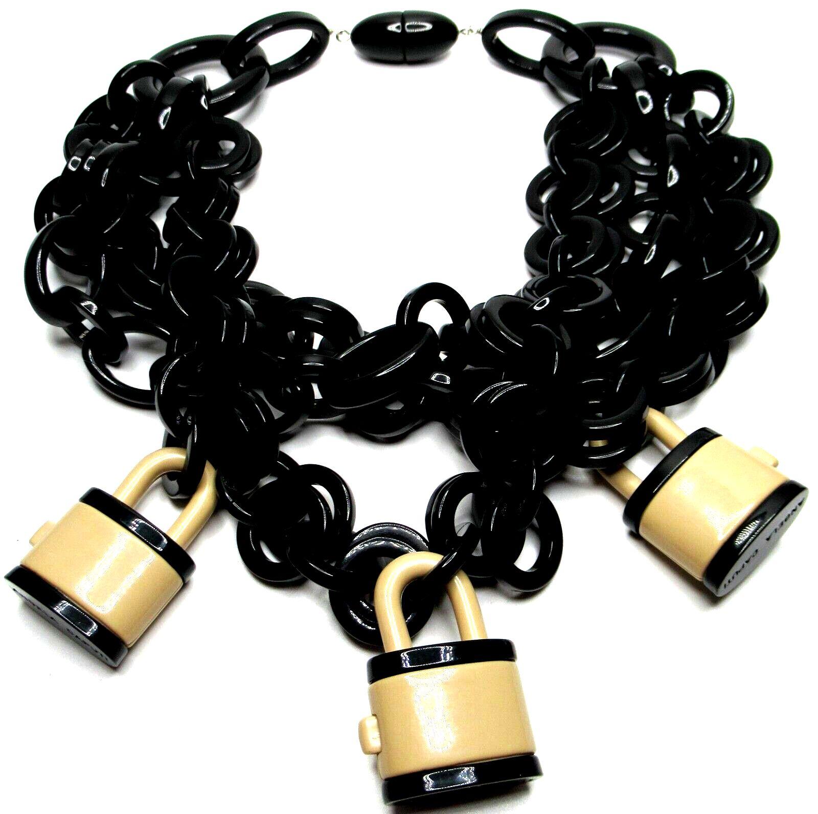 Simply Beautiful! Vintage ANGELA CAPUTI Designer Signed Black and Tan Working Padlock Runway Statement Necklace Italy. Featuring round, black Resin Cable Links suspending three two-tone resin Padlocks, completed by a Barrel-shaped snap clasp,