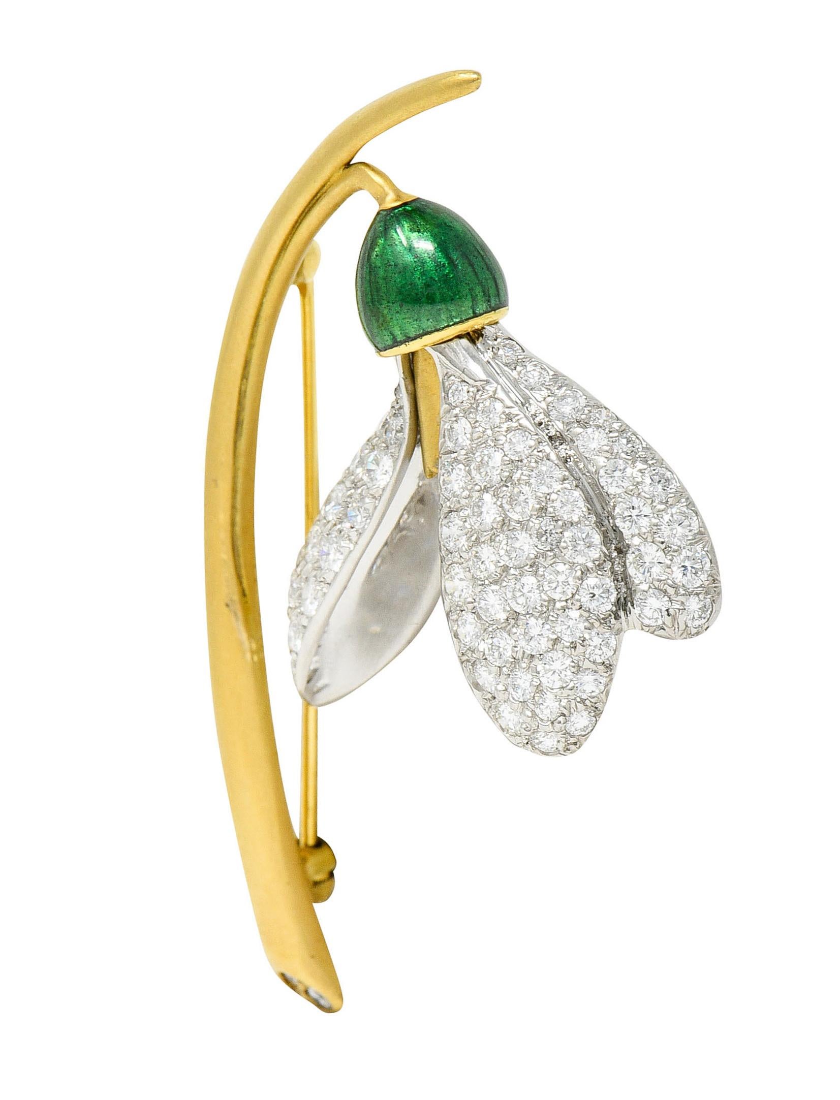 Floral bar brooch is designed as a stylized snowdrop flower

With a matte gold stem and bell-like internal petals

White gold petals are dimensional and are pavè set with round brilliant cut diamonds

Weighing in total approximately 1.75 carats with
