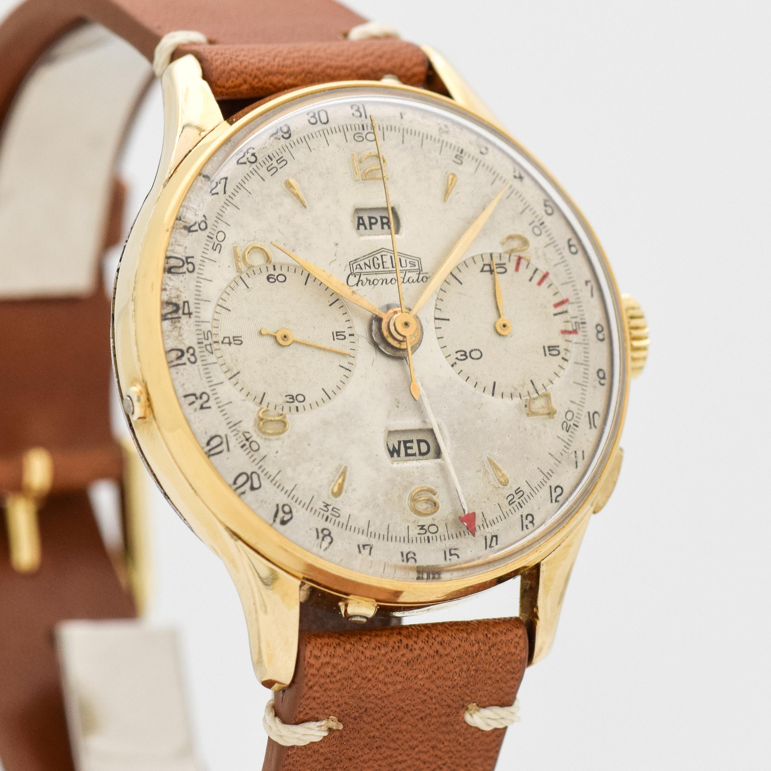 1950's Vintage Angelus Chronodata Triple Date Calendar 2 Register Chronograph Large 38 mm Wide 14k Yellow Gold Filled with Stainless Steel Case Back watch with Original Silver Dial with Applied Gold Color Arabic 2, 4. 6, 8, 10, and 12 with Elongated