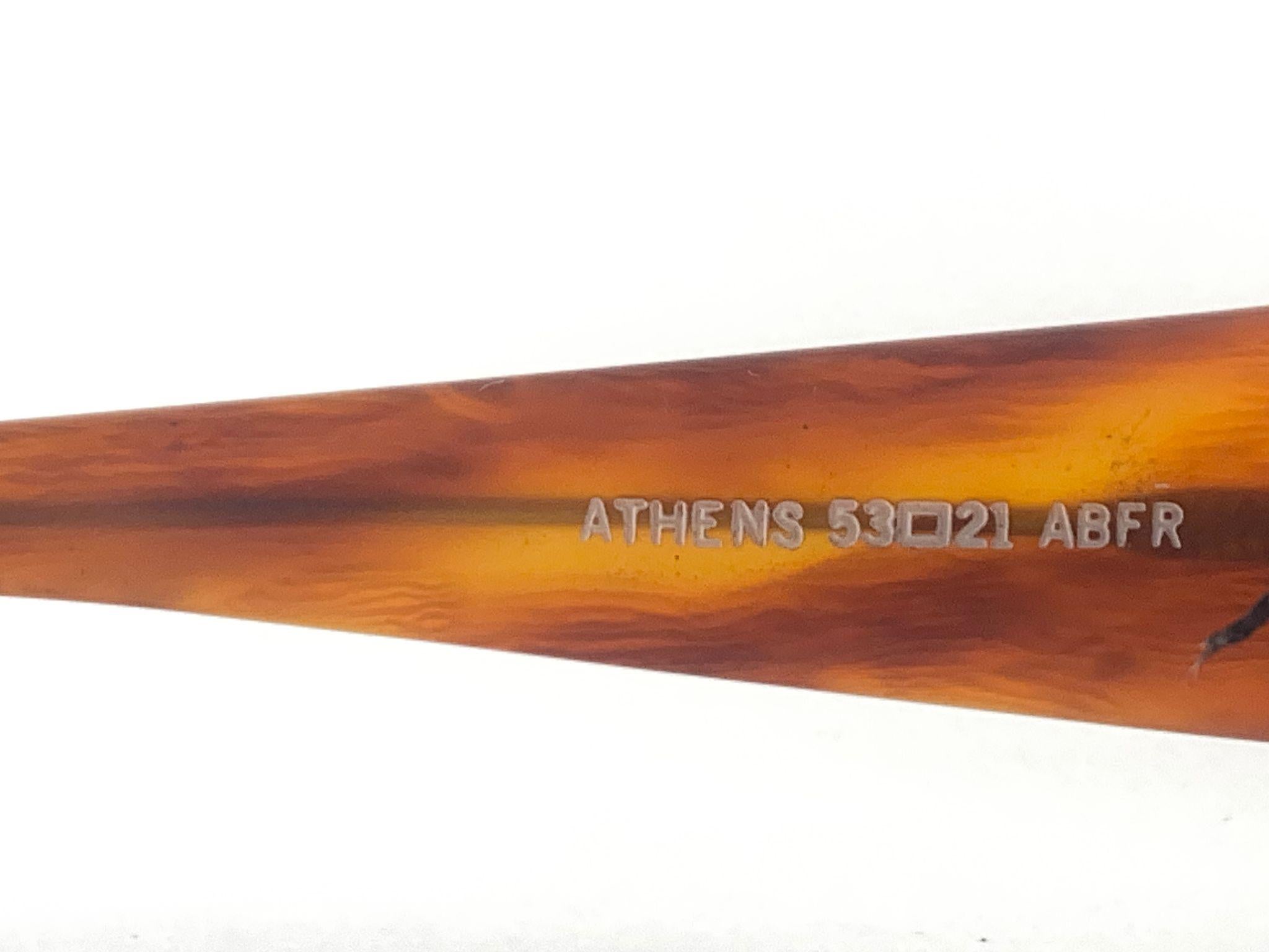 Highly Collectable Sonnenbrille signiert von Englisch Anglo American Optical.

Vintage Anglo American Optical Eyewear Schildkröte Maske mit  Braun Linsen.

Dieser Artikel kann aufgrund der Lagerung geringfügige Abnutzungserscheinungen aufweisen. 