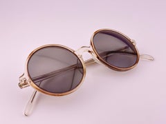 Gafas de sol vintage de Anglo American Optical, redondas, de los años 90, de Inglaterra