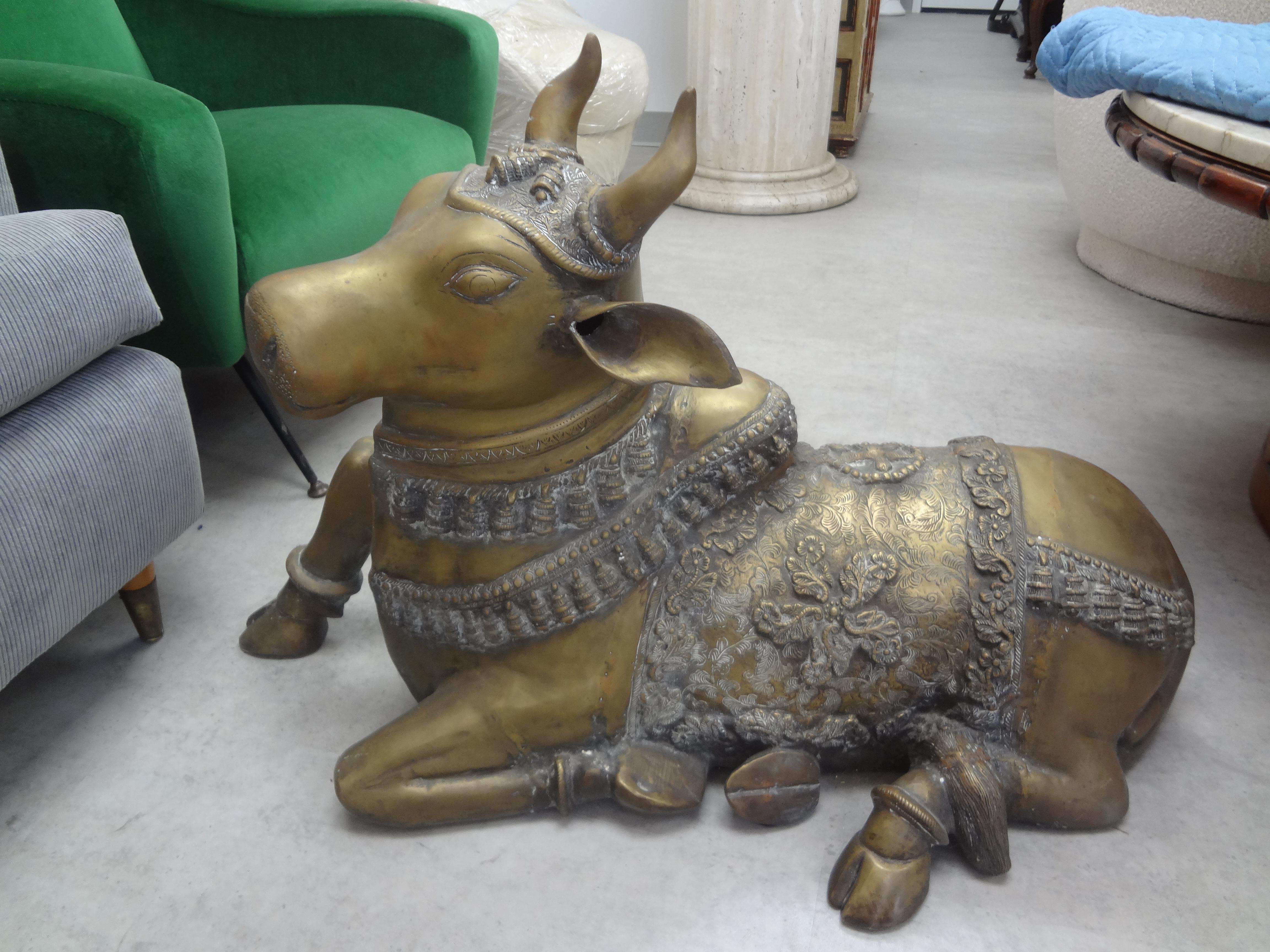Vintage Anglo-Indian brass cow sculpture.
Beautiful detail and patina to the brass!