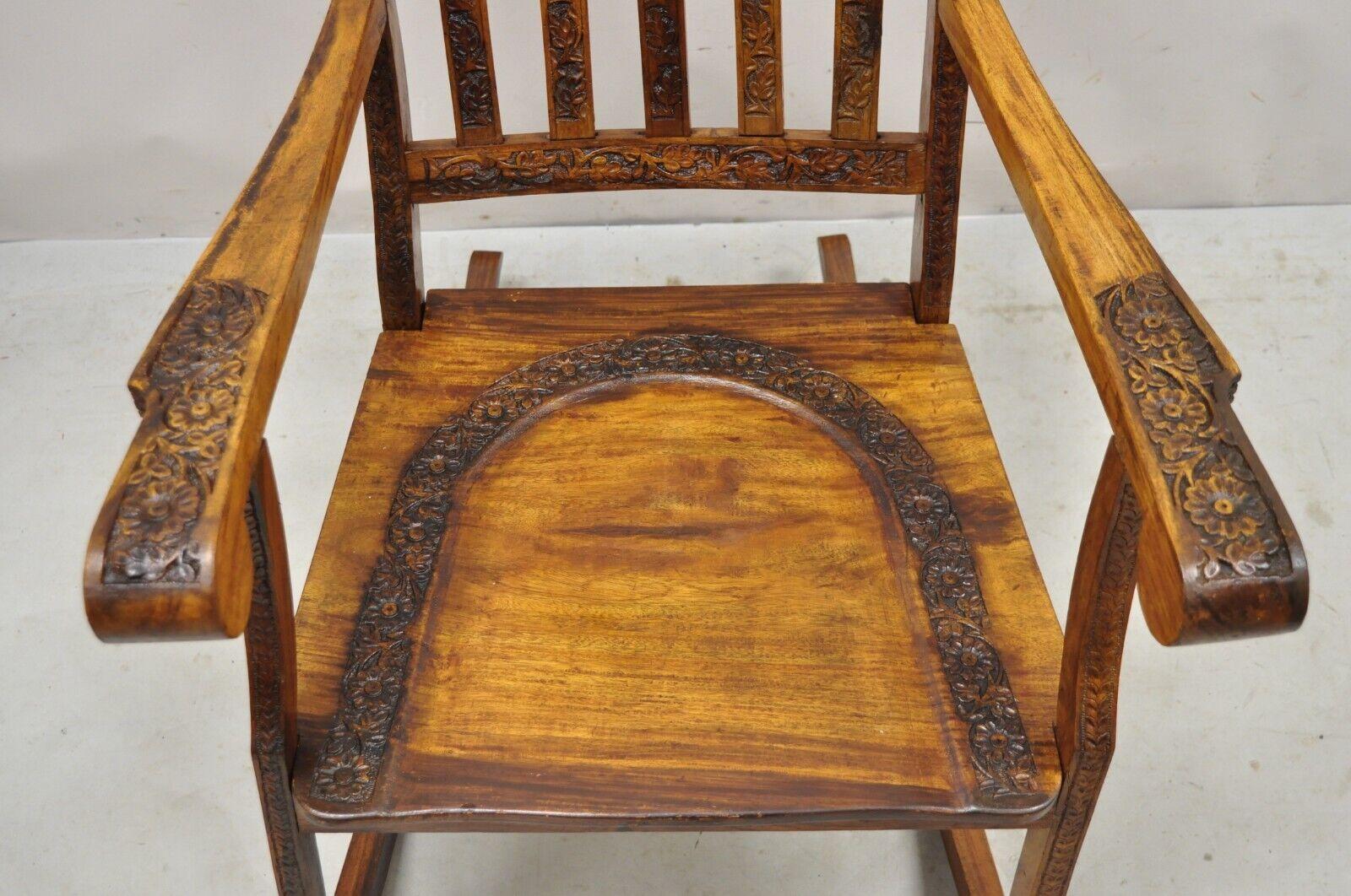 Vintage Anglo Indian Carved Teak Wood Rocking Chair Rocker In Good Condition For Sale In Philadelphia, PA