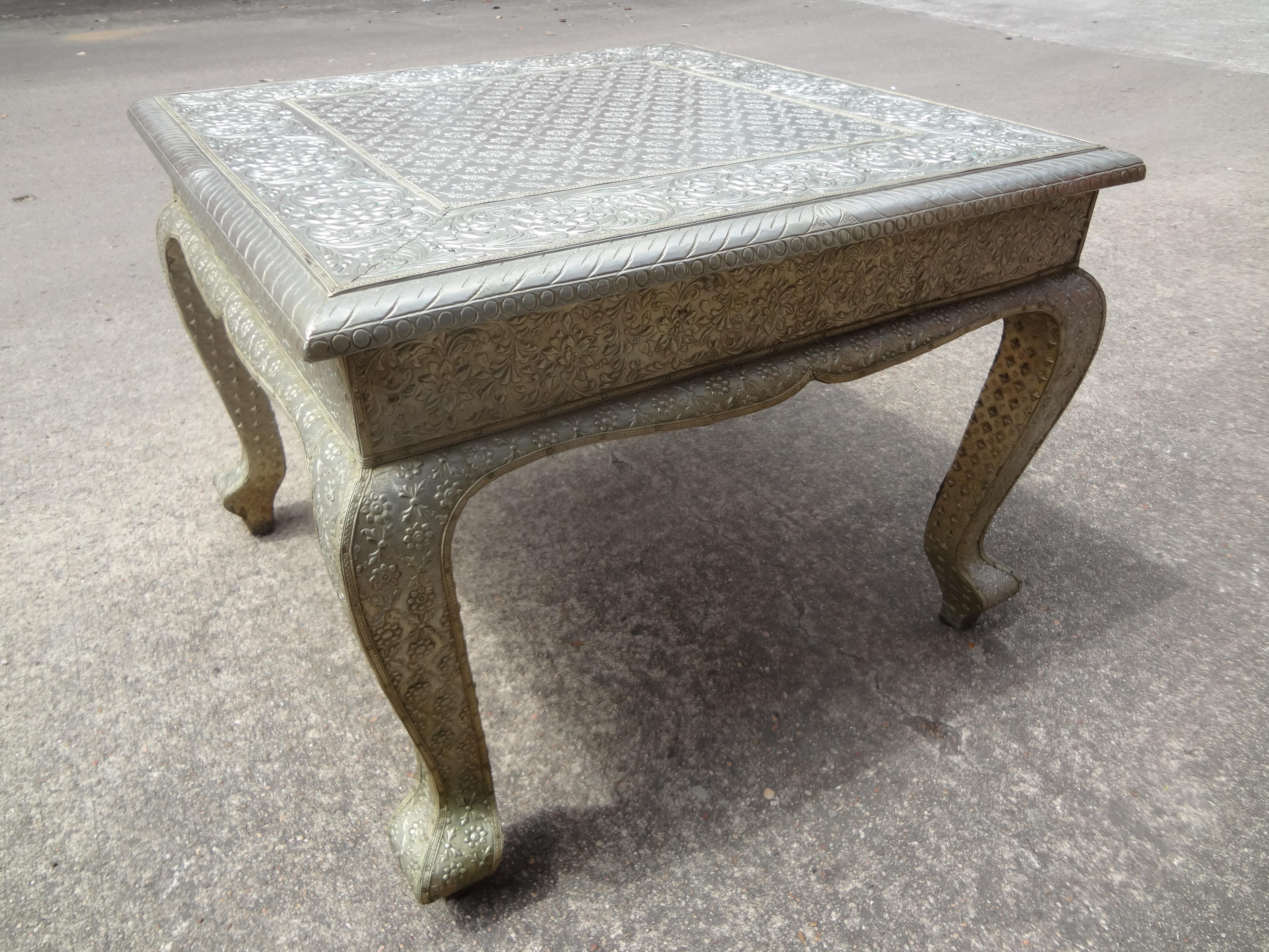 Vintage Anglo-Indian metal clad table.
Great vintage Anglo-Indian silver metal clad square table. This versatile table can be used as a side table, end table, coffee table or cocktail table.