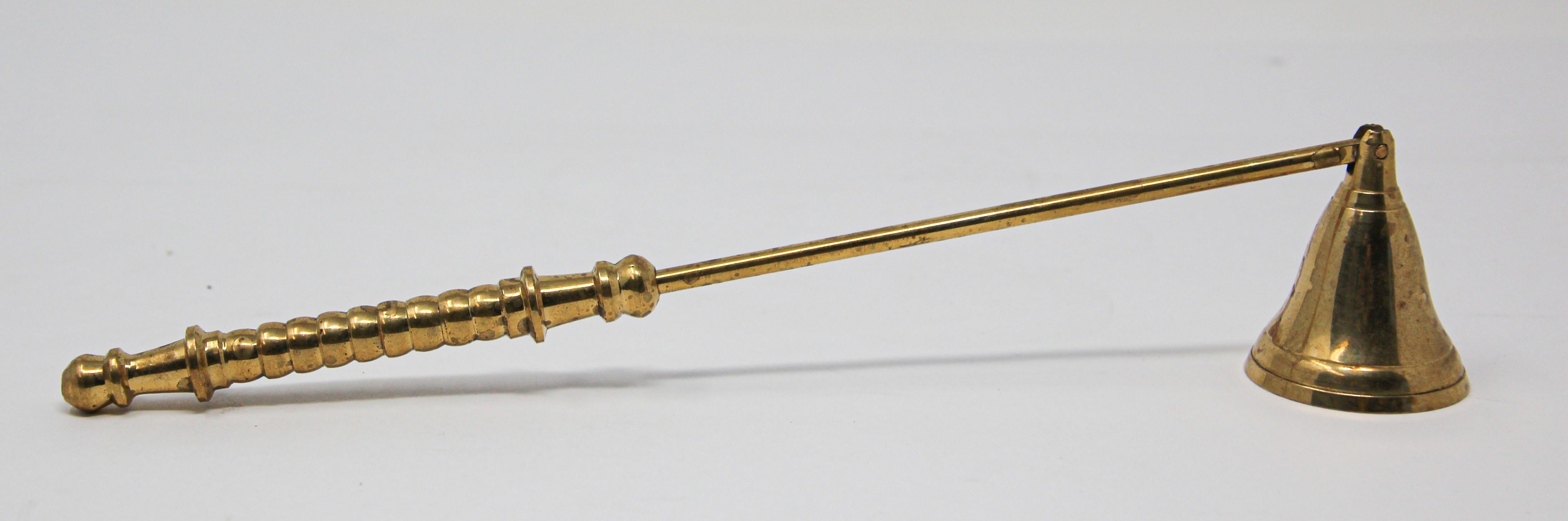 Vintage Anglo-Indian style polished brass candle snuffer.
Articulated arm candle snuffer with Victorian details on the brass grip handle.
Conical shape snuffer with ribbed arm and rounded handle.
Size: 10” L x 1.75” H x 1.5” D.
Handcrafted in