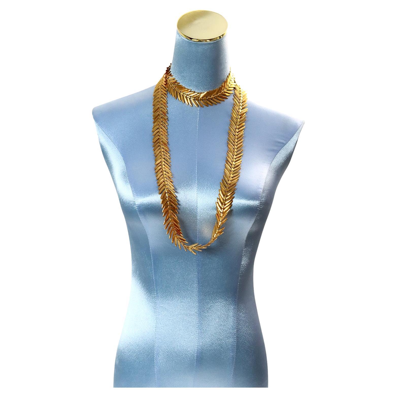 Vintage Anne Klein Arrow Like Gold Tone Long Necklace.  This can be worn doubled, tripled and doubled with the necklace against your neck as shown by my photos. Anne Klein was the designer of the 1980's.  Anne klein jewelry is/was highly coveted as