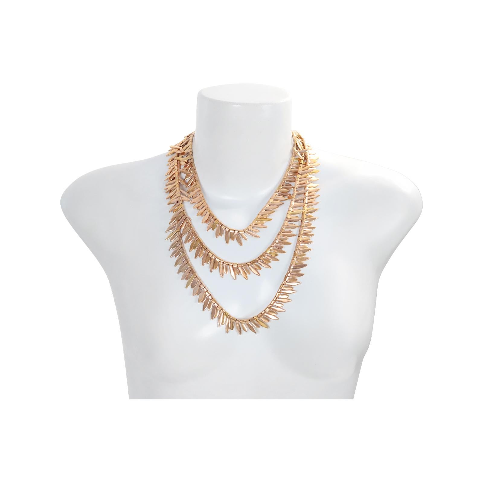 Vintage Anne Klein Arrow/Feather-Like Gold-Tone Long Necklace. As shown in my photos, this necklace can be worn doubled, tripled, or doubled with the necklace against your neck. Anne Klein was the designer of the 1980s. Her jewelry and designs are